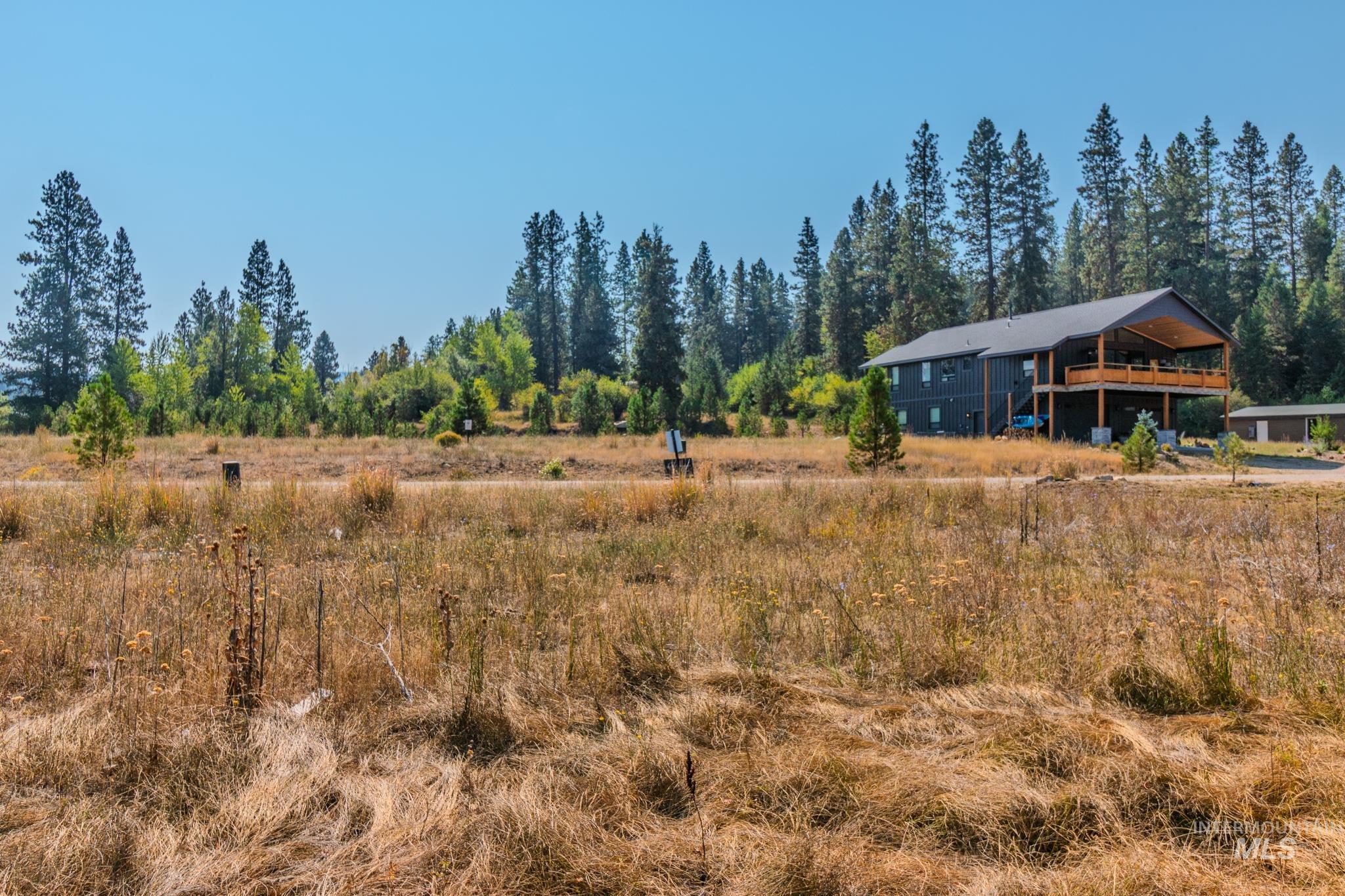 View of yard with a rural view