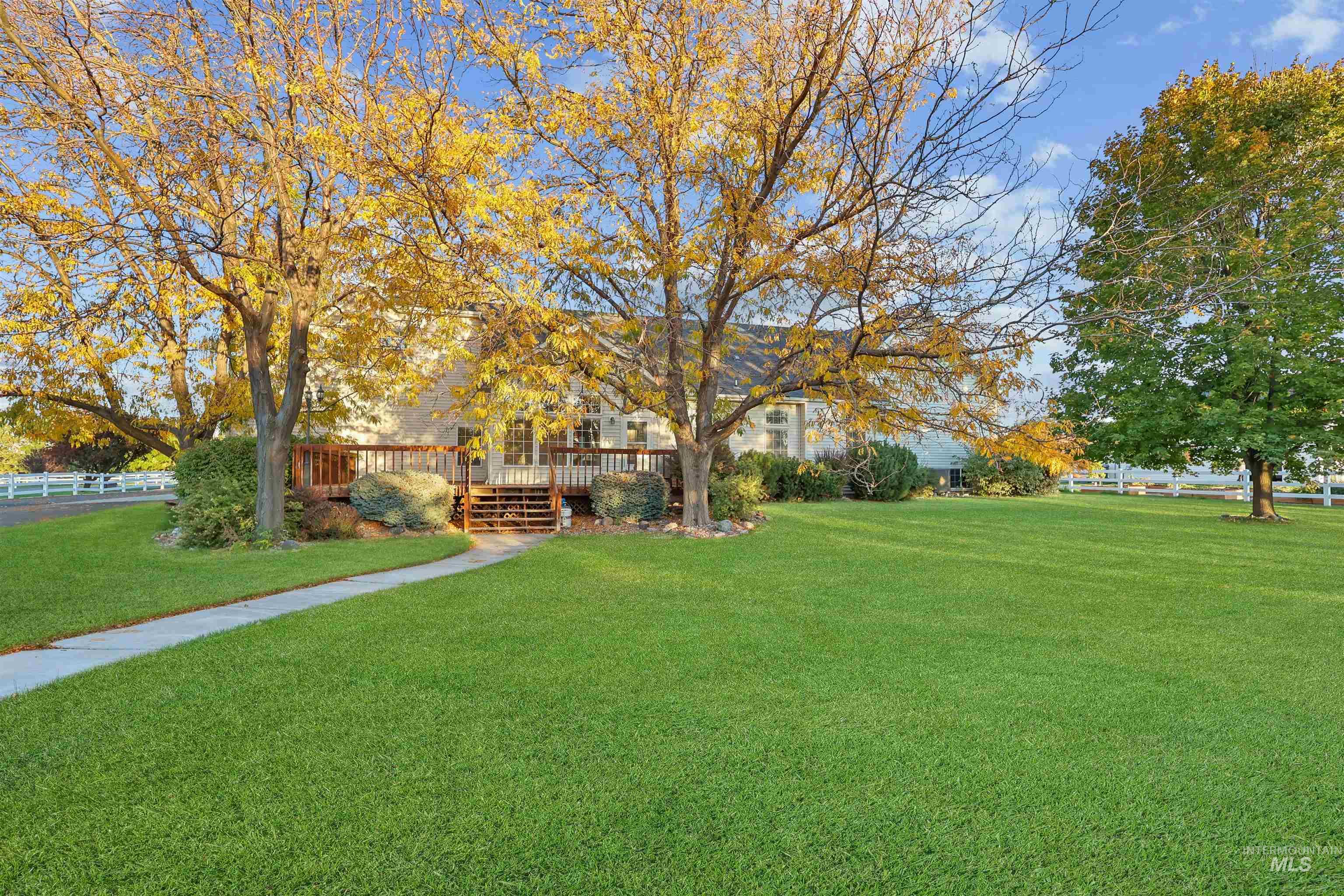 View of yard with a deck