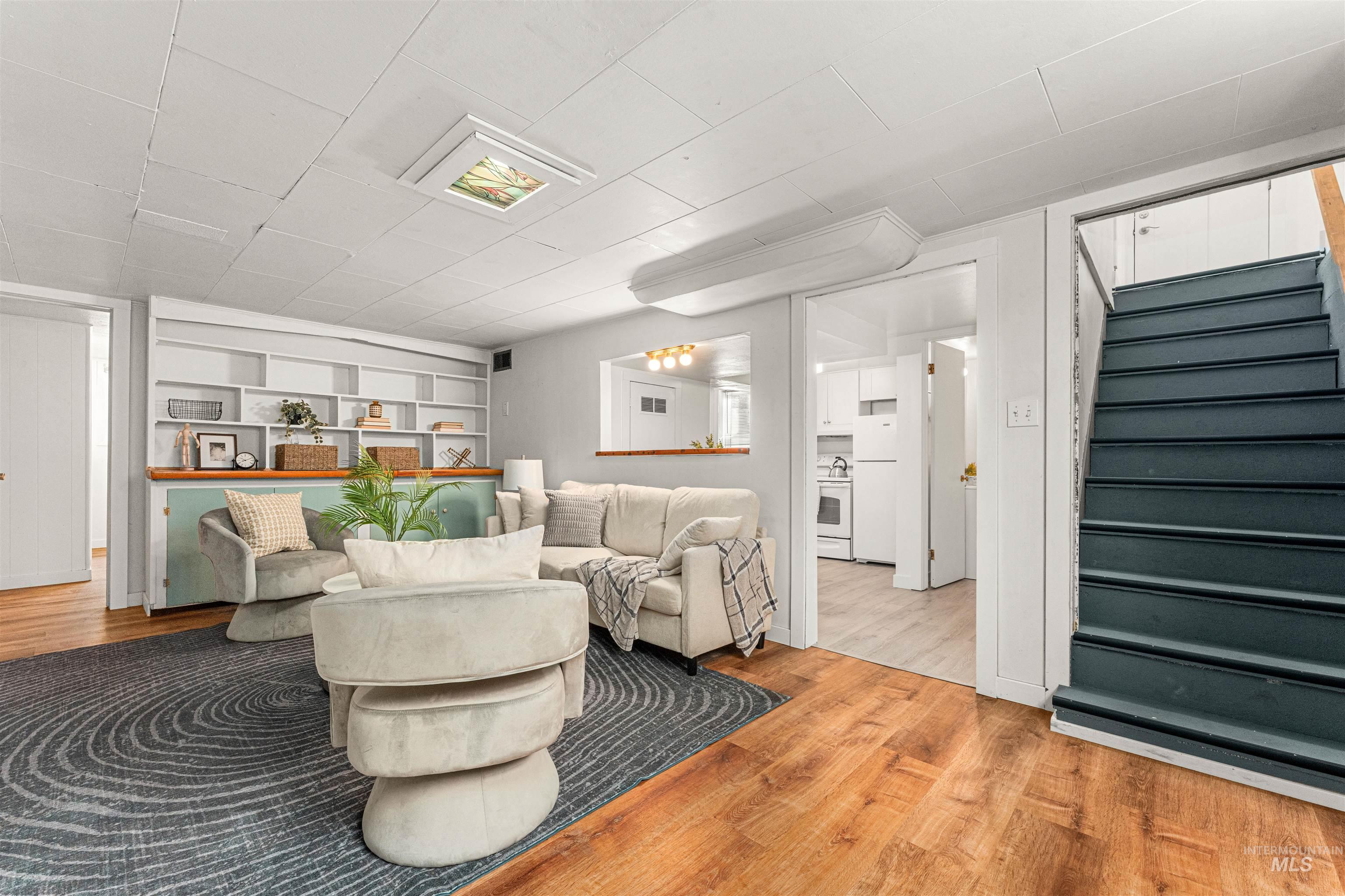 Full bath featuring shower / tub combo with curtain and vanity