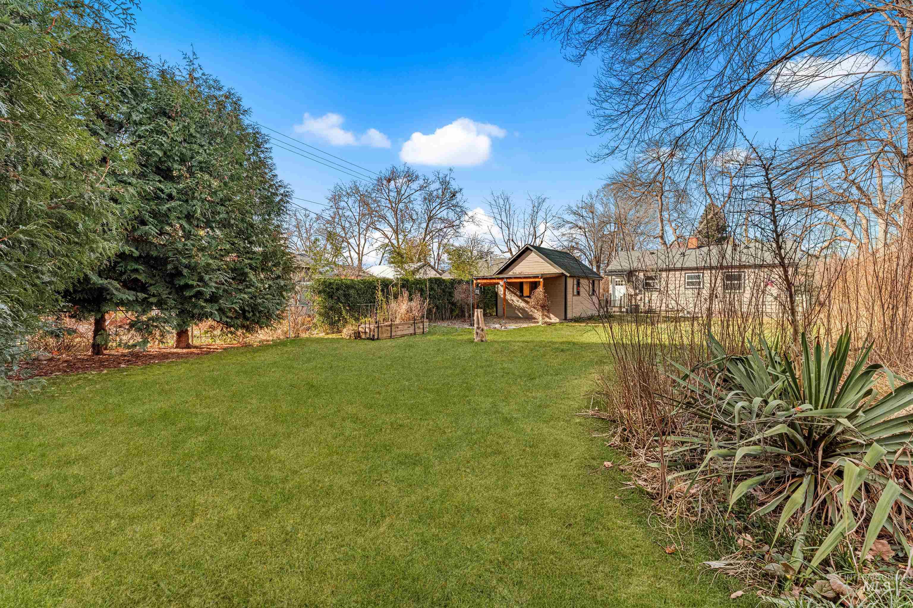 View of yard with an outdoor structure