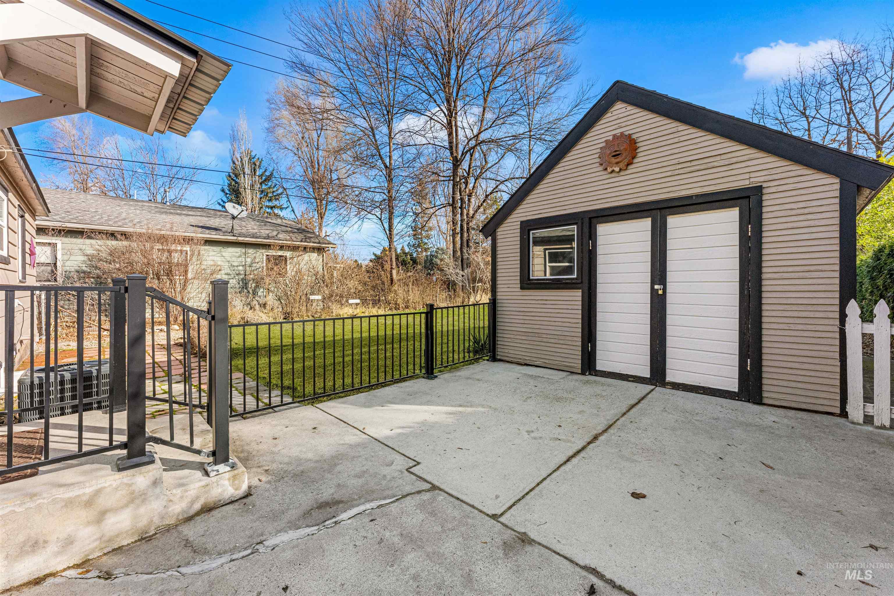 Garage with a storage shed