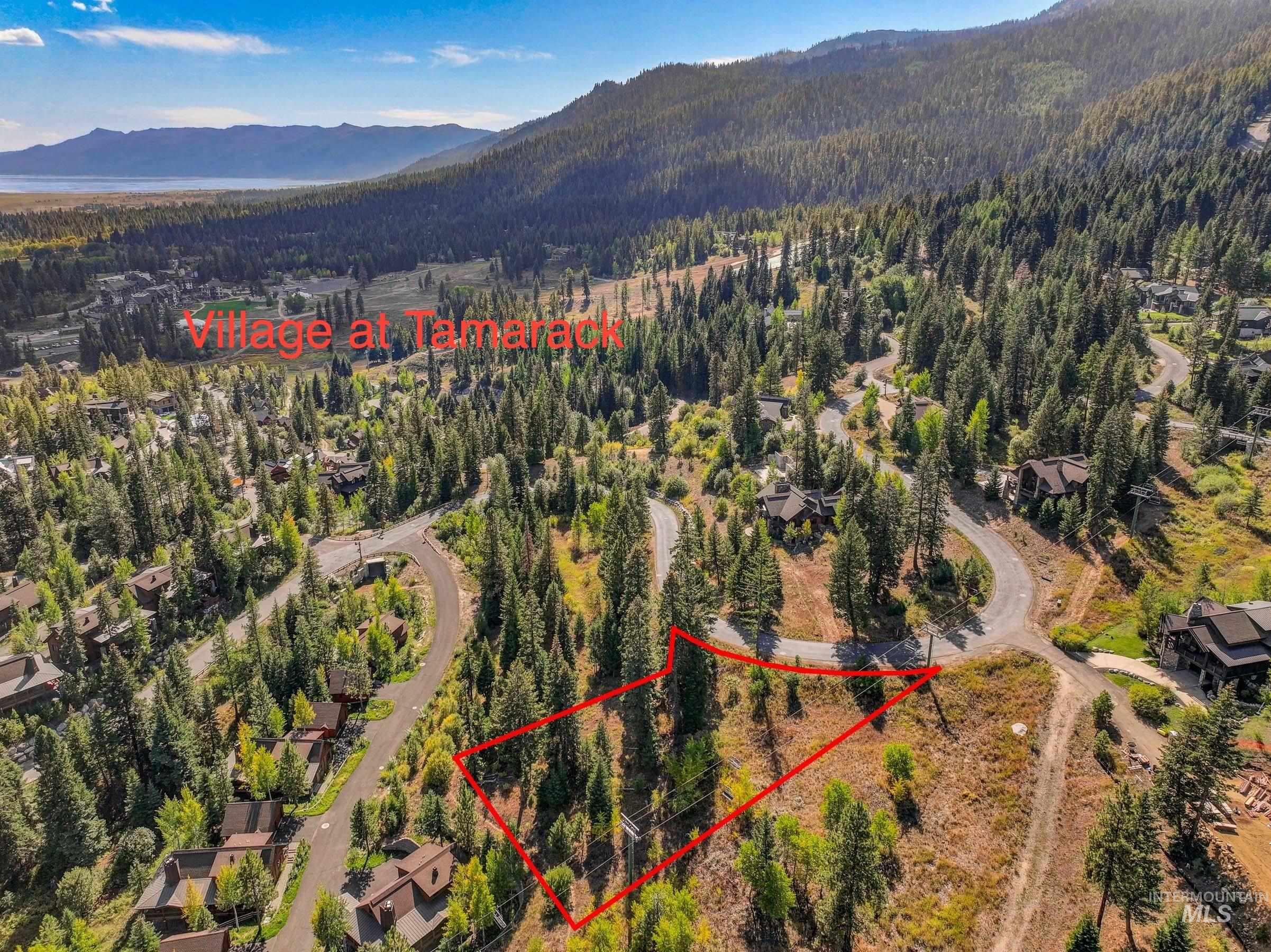 Aerial view of property's location in the resort featuring  property parcel outlined