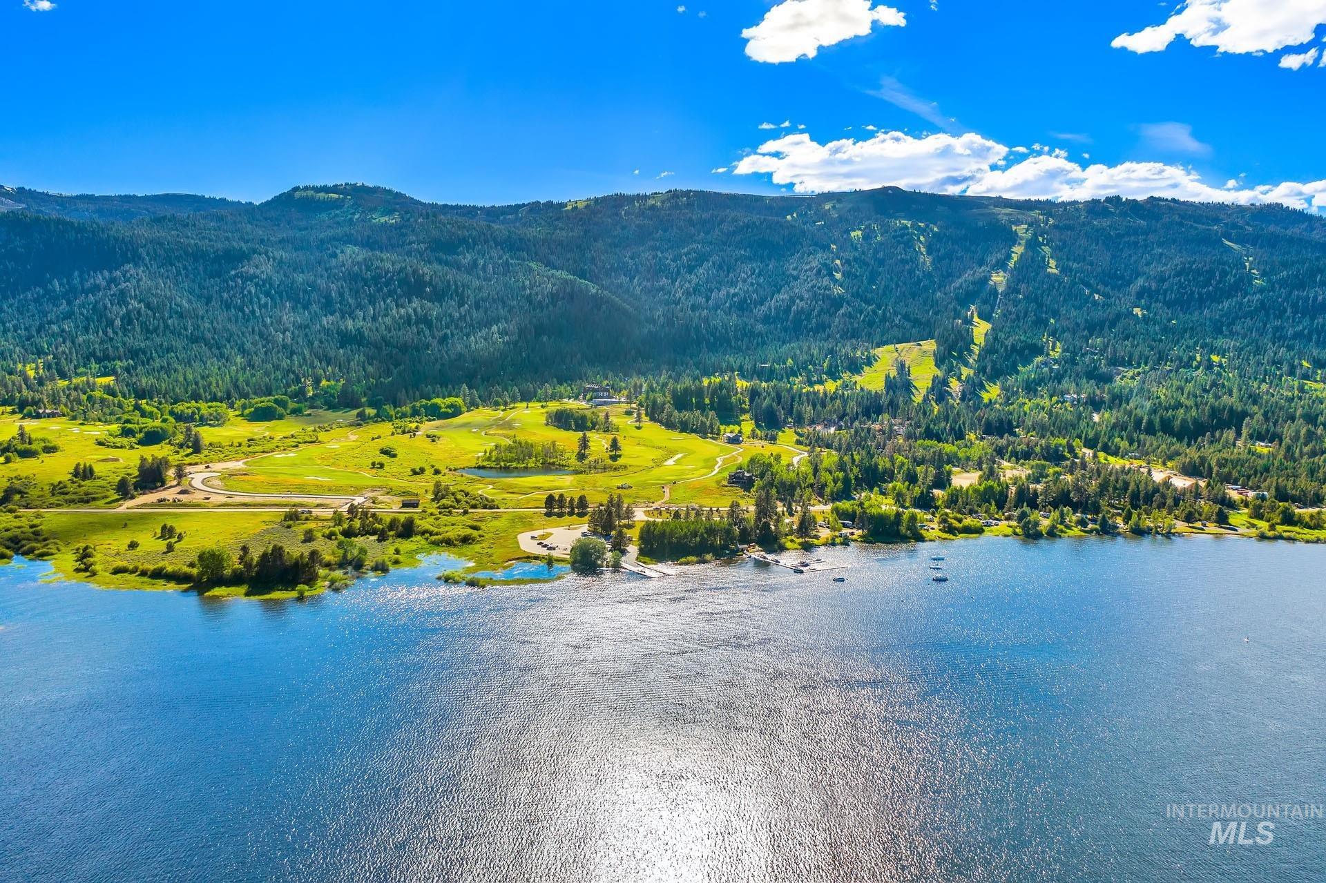 Drone / aerial view of Cascade Lake and ski mountain