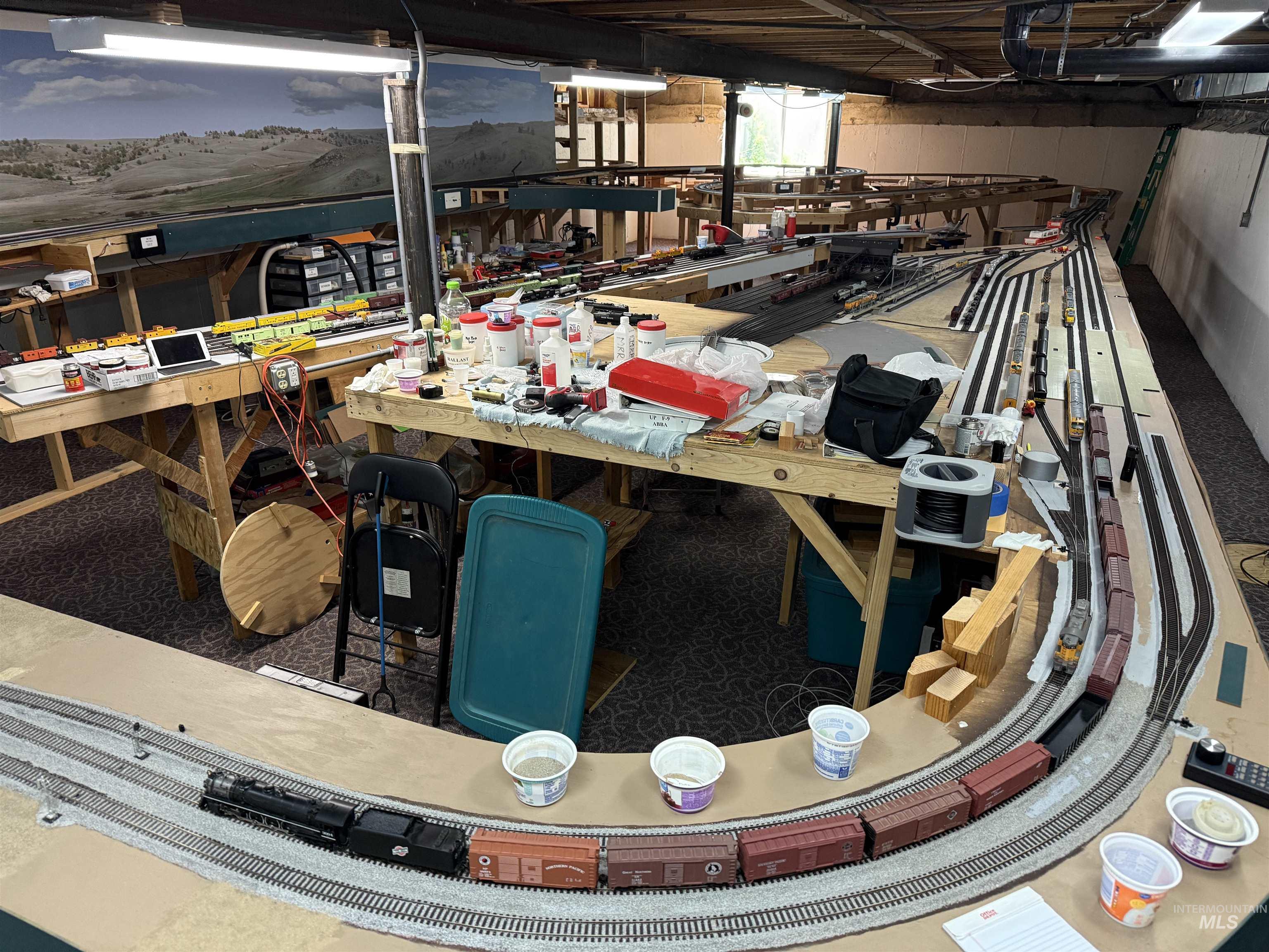 This huge trainset is the reason the basement was built! (Train set has been removed.)