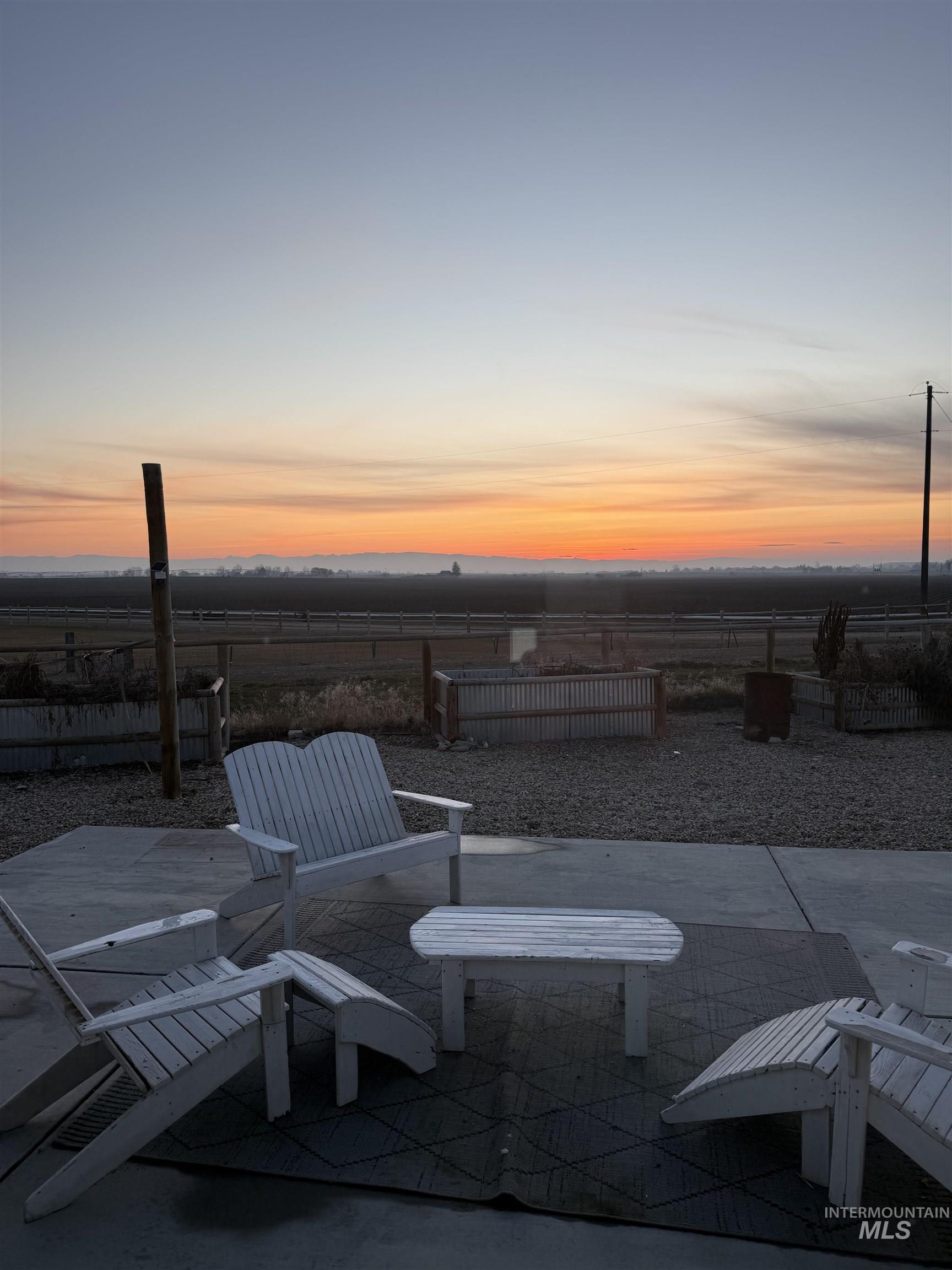 Fenced backyard with a patio area