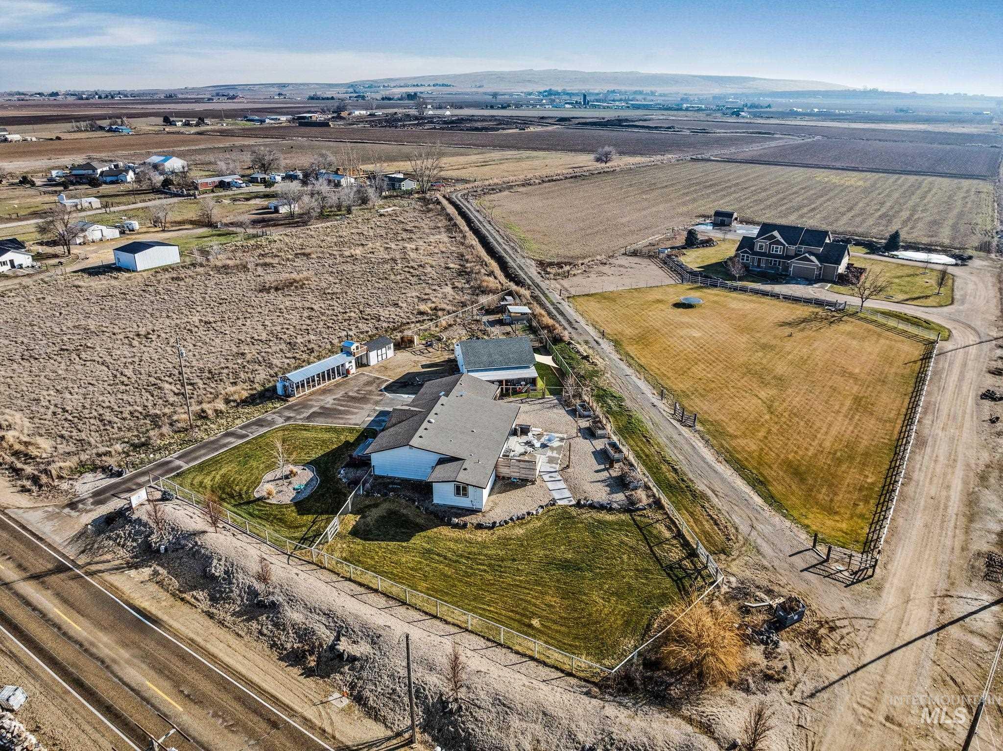 Aerial overview of property's location with rural landscape