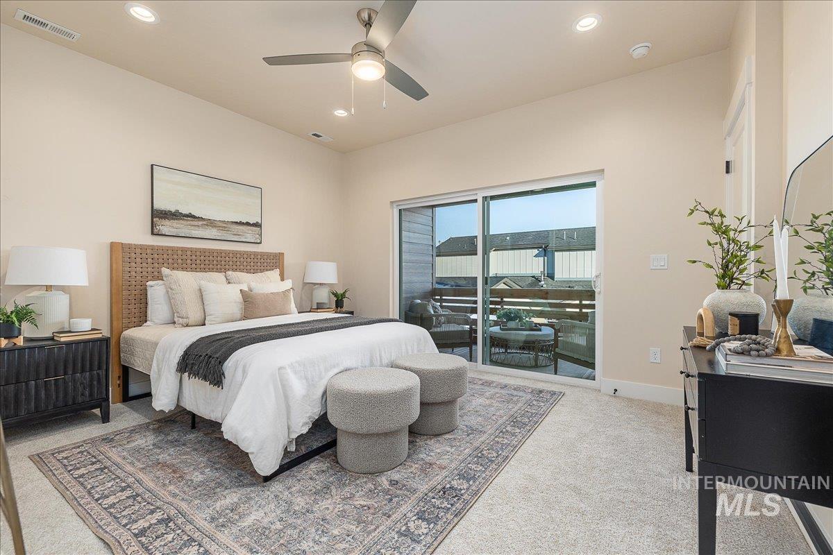 Bedroom featuring a ceiling fan, access to outside, light colored carpet, and recessed lighting