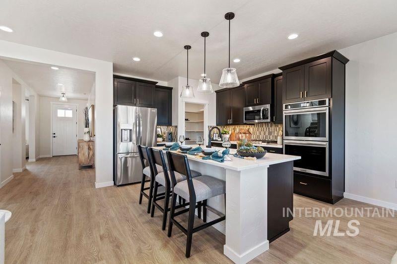 Photo of 9517 S Geothermal Ave, Kuna, ID 83634 (MLS # 98999994)