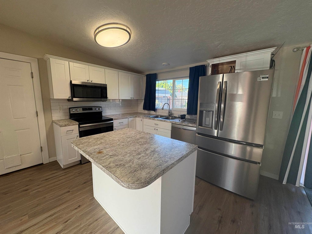 Photo of 1521 N Plateau Ave, Caldwell, ID 83605 (MLS # 98999612)