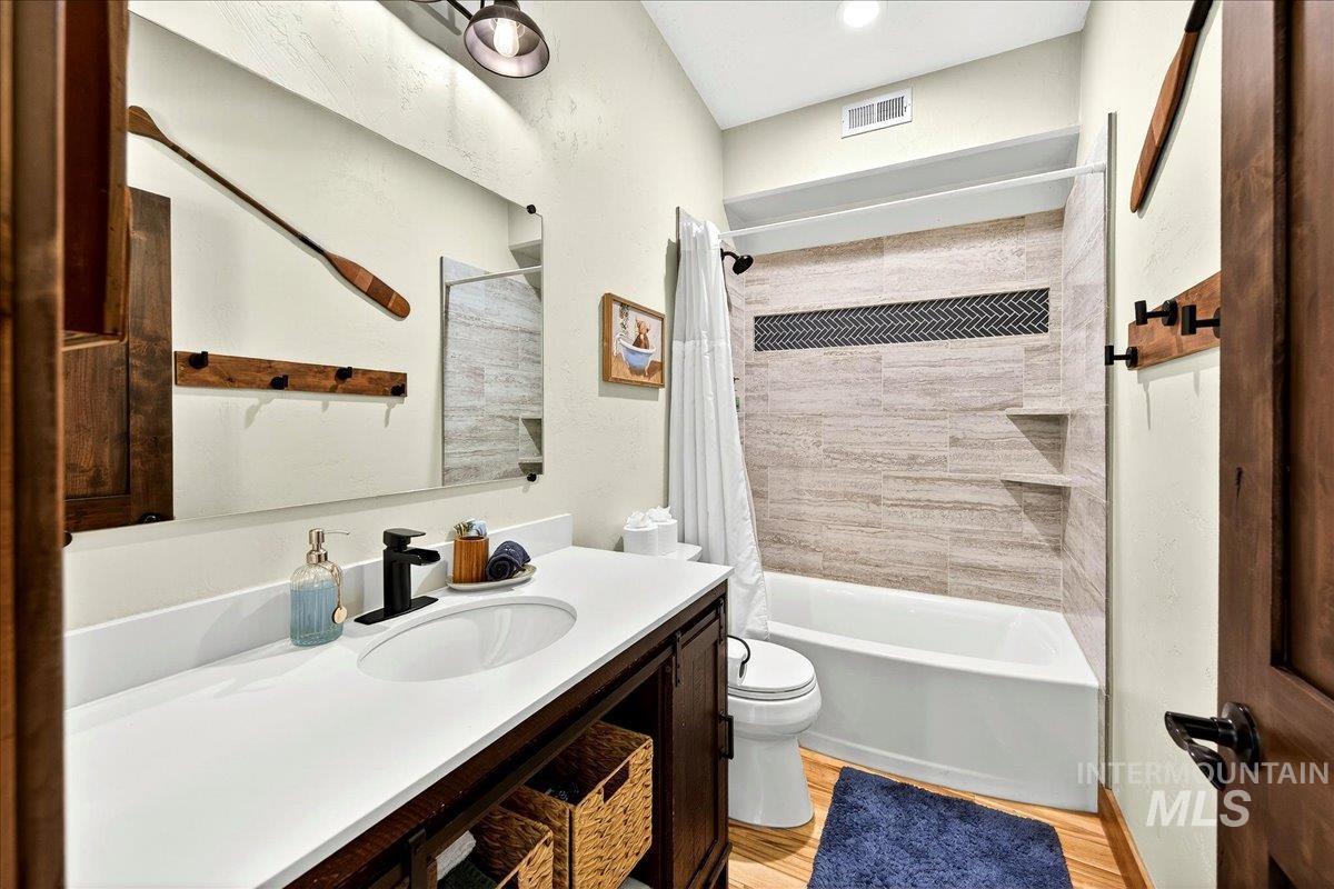 Quartz counter and tile shower surround
