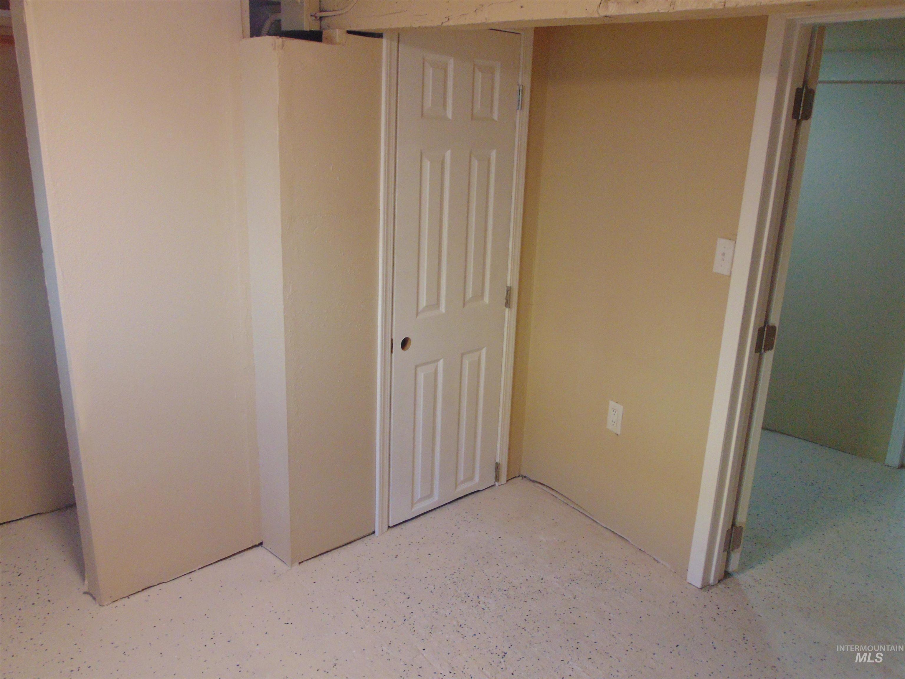 Unfurnished bedroom with a closet