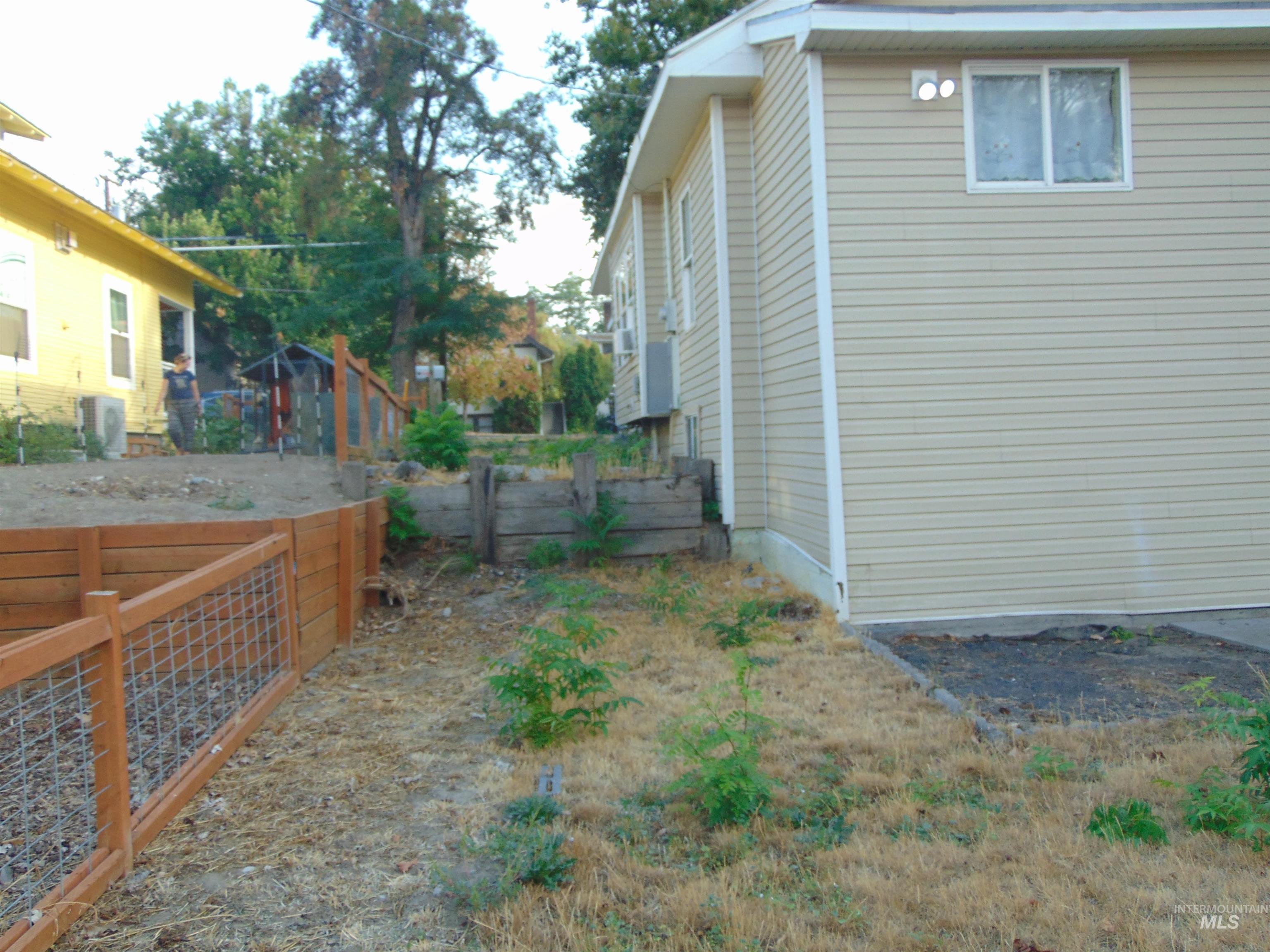 View of property exterior featuring an ac unit