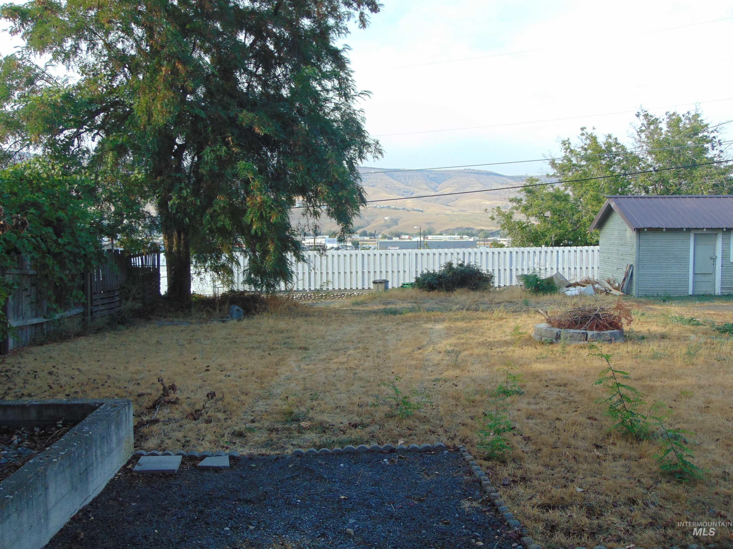 View of fenced backyard