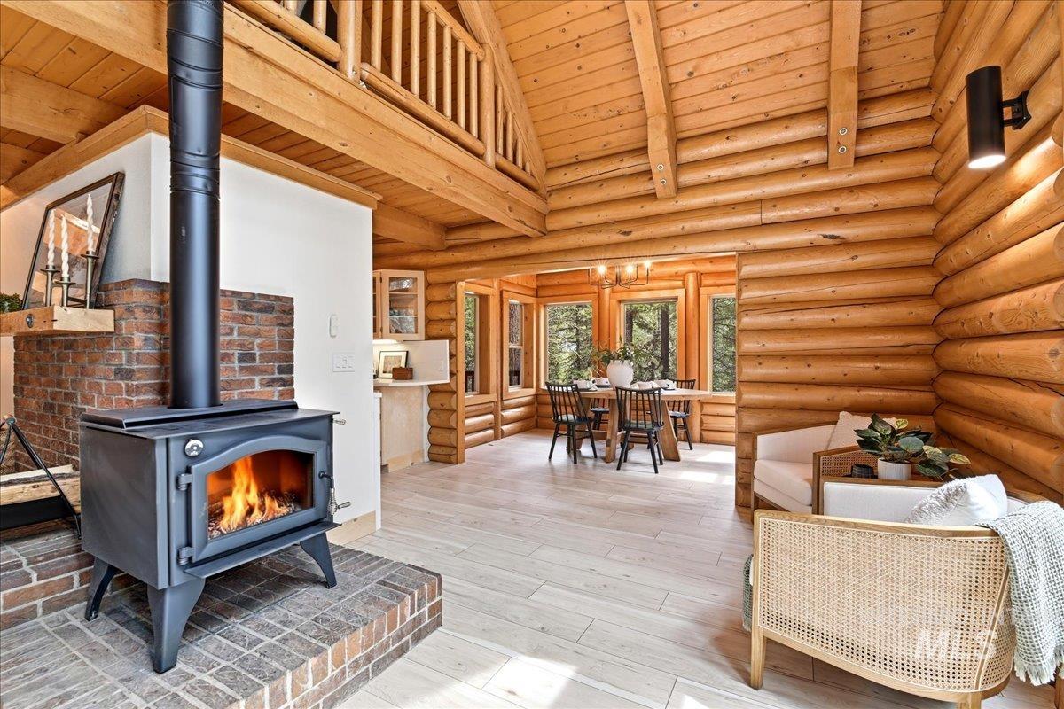 Wood-burning stove with a brick hearth and exposed brick surround