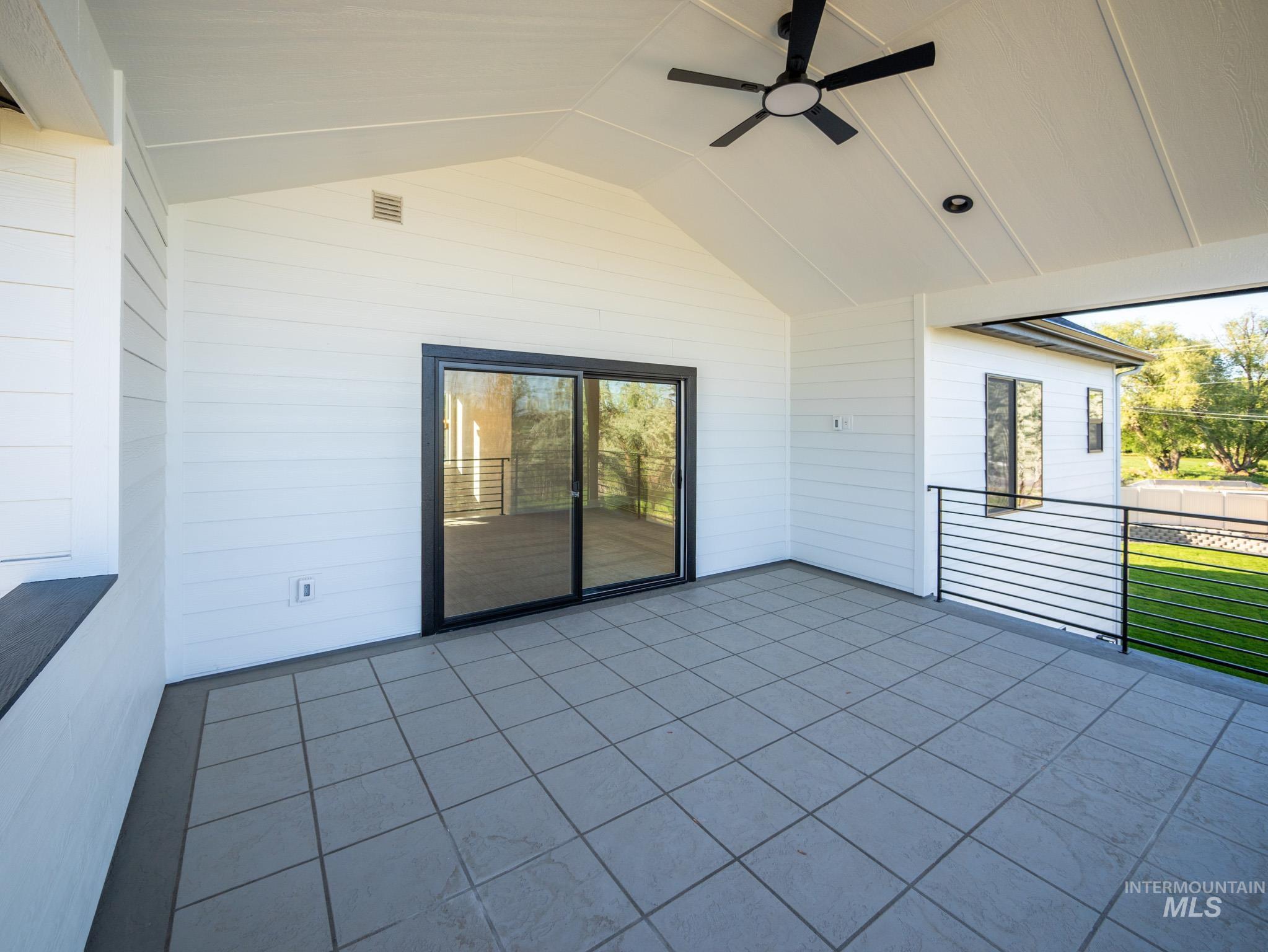 View of patio with ceiling fan
