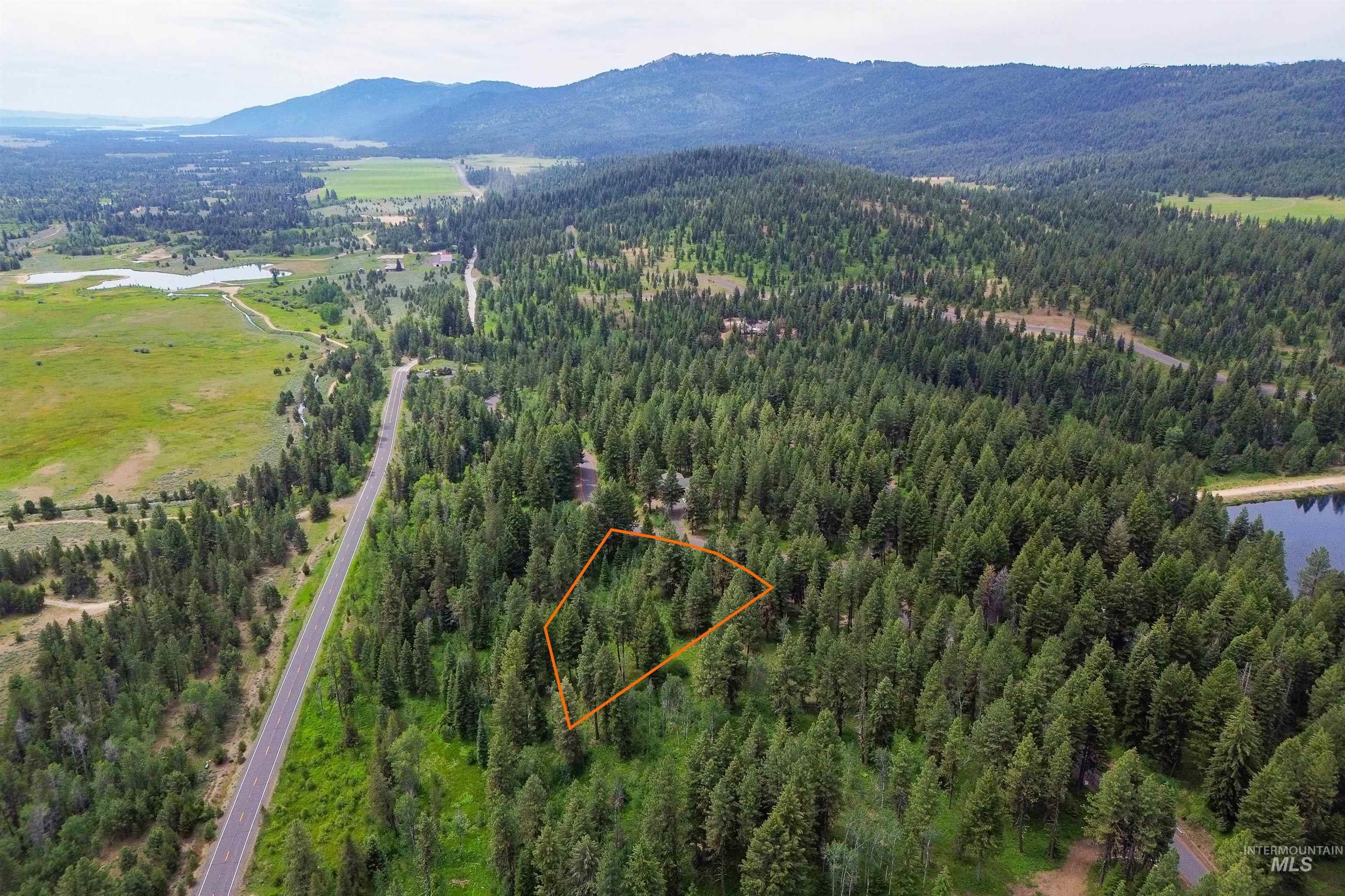 Aerial view of property's location featuring mountains and property boundaries highlighted