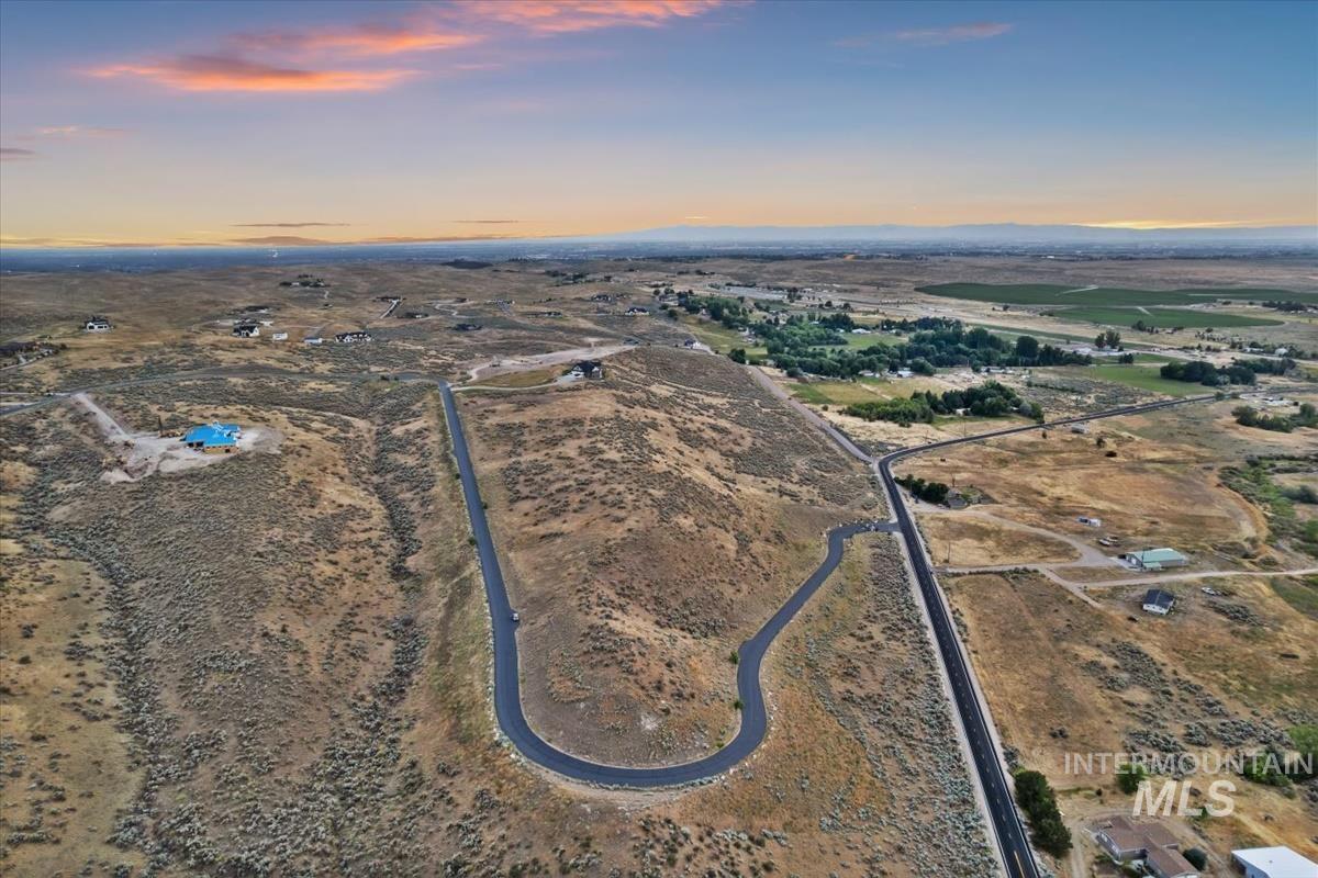 Aerial view at dusk of a rural view and view of desert