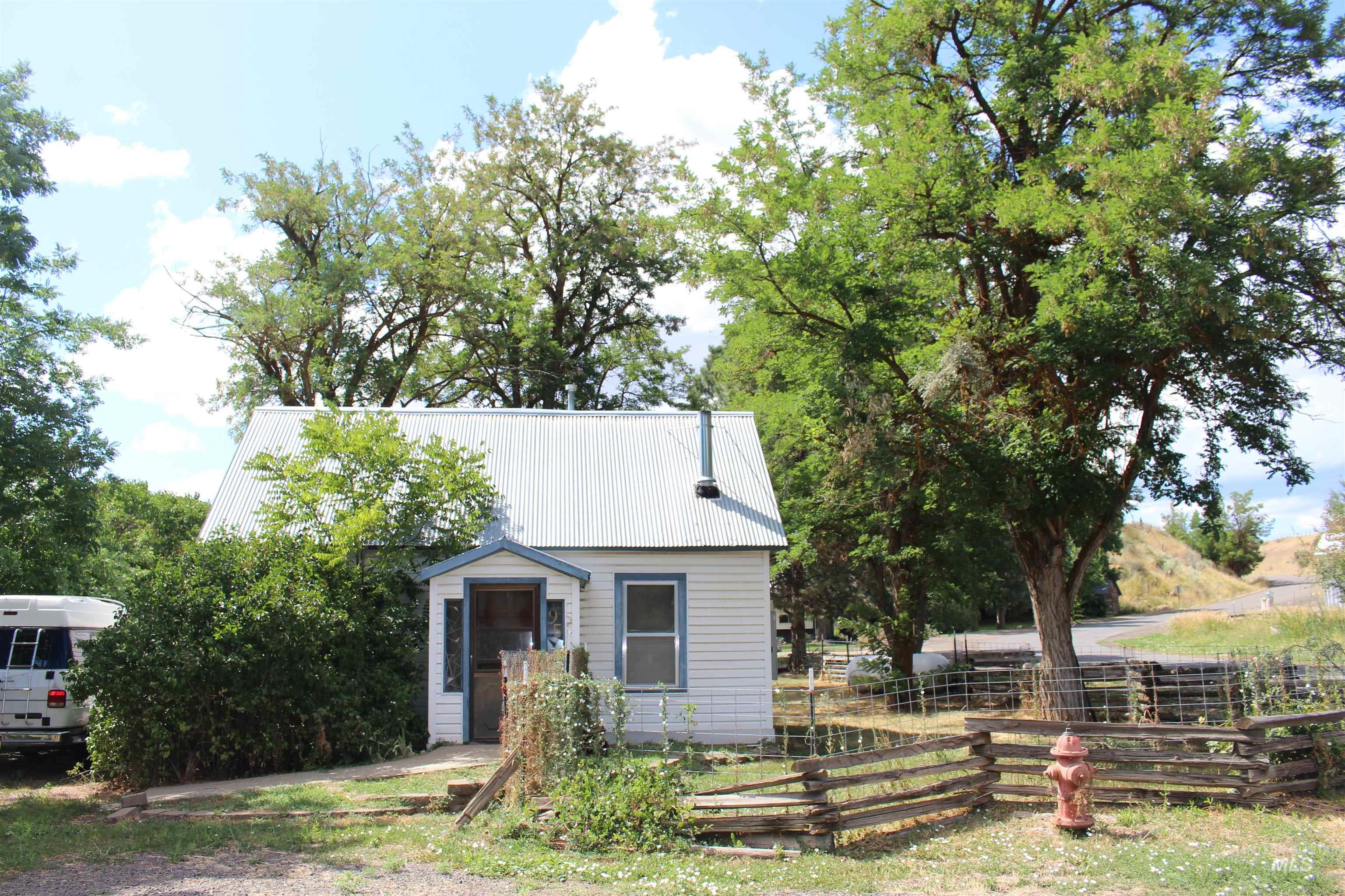 View of front of home with a metal roof