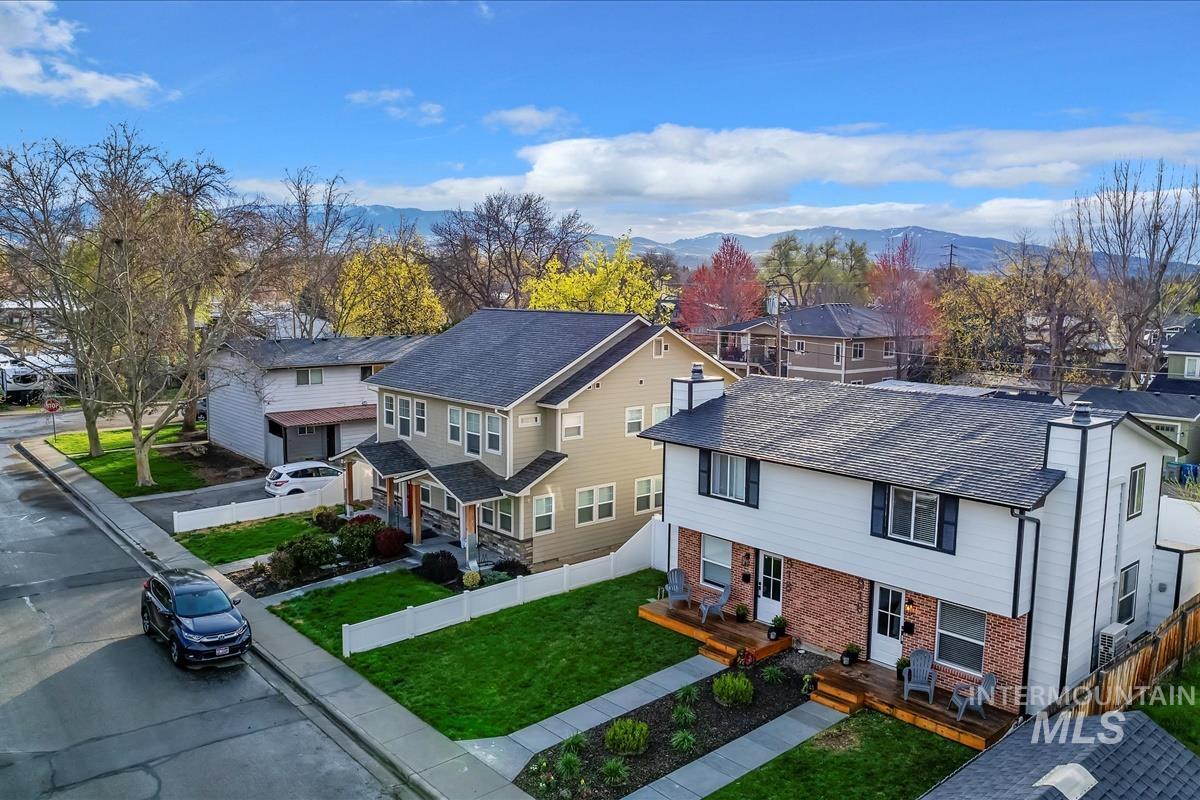 Aerial perspective of suburban area featuring mountains
