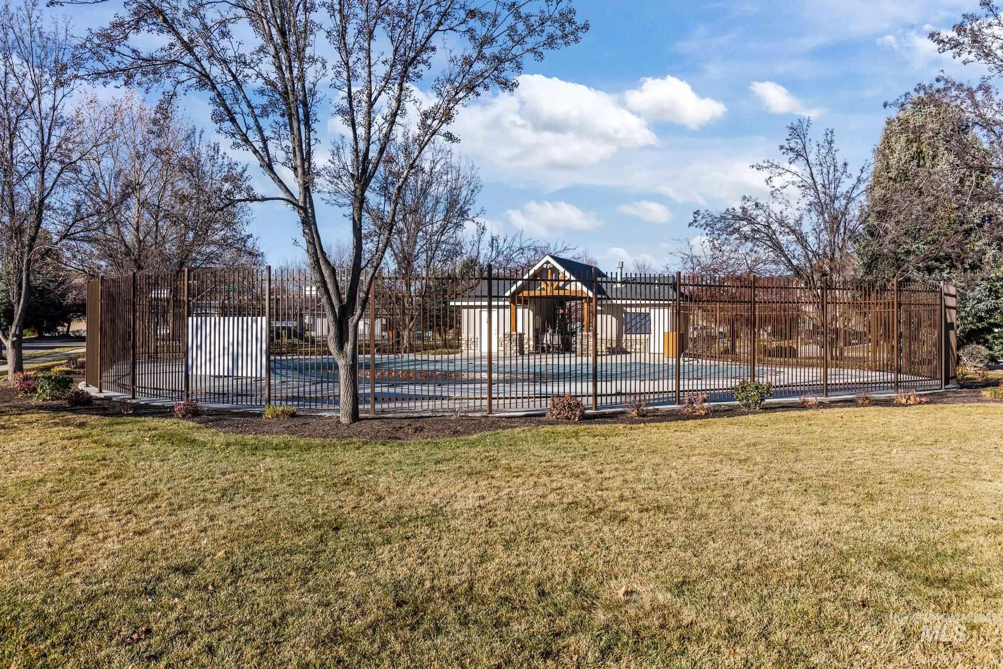 View of yard featuring a community pool