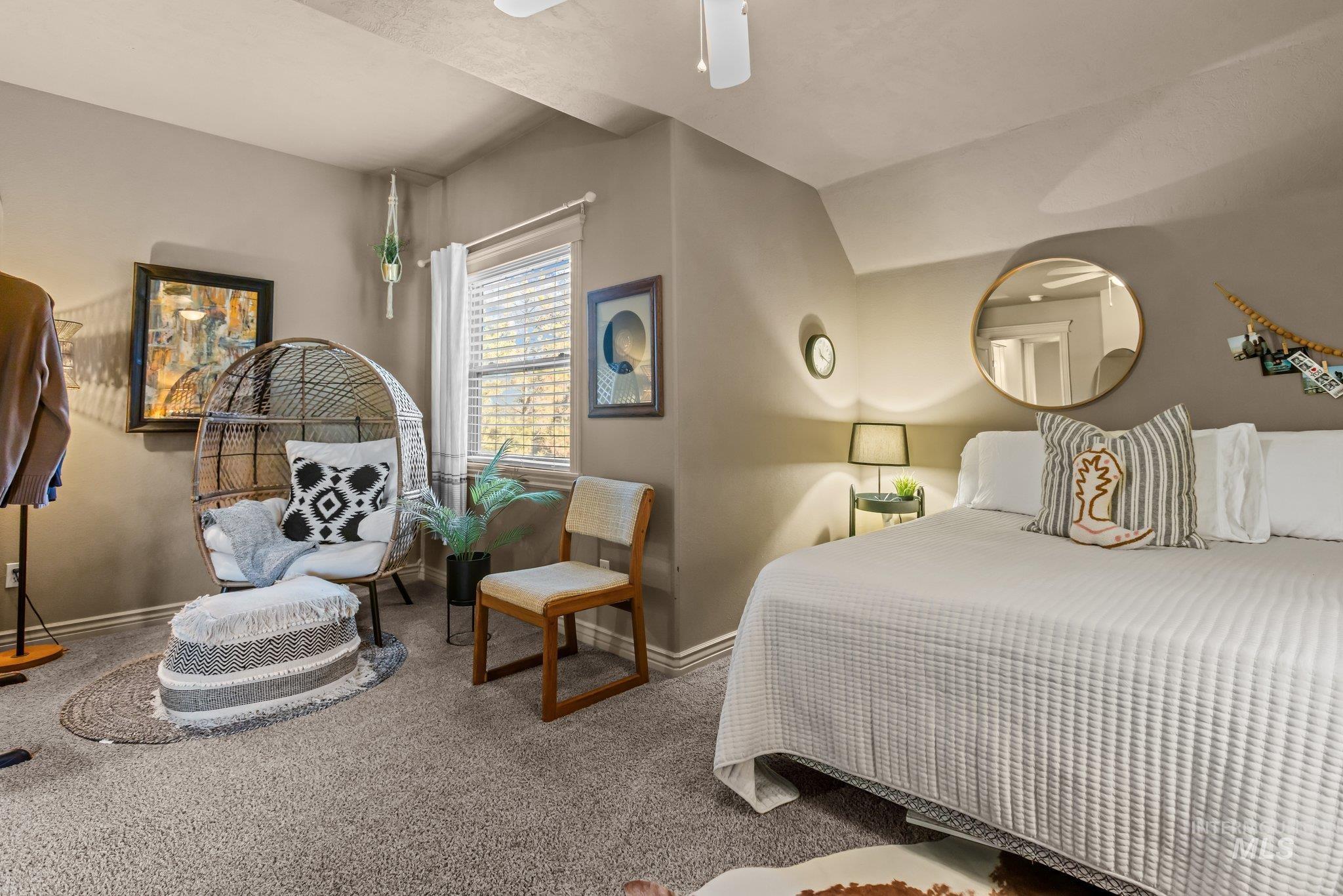 Bedroom featuring carpet floors and a ceiling fan