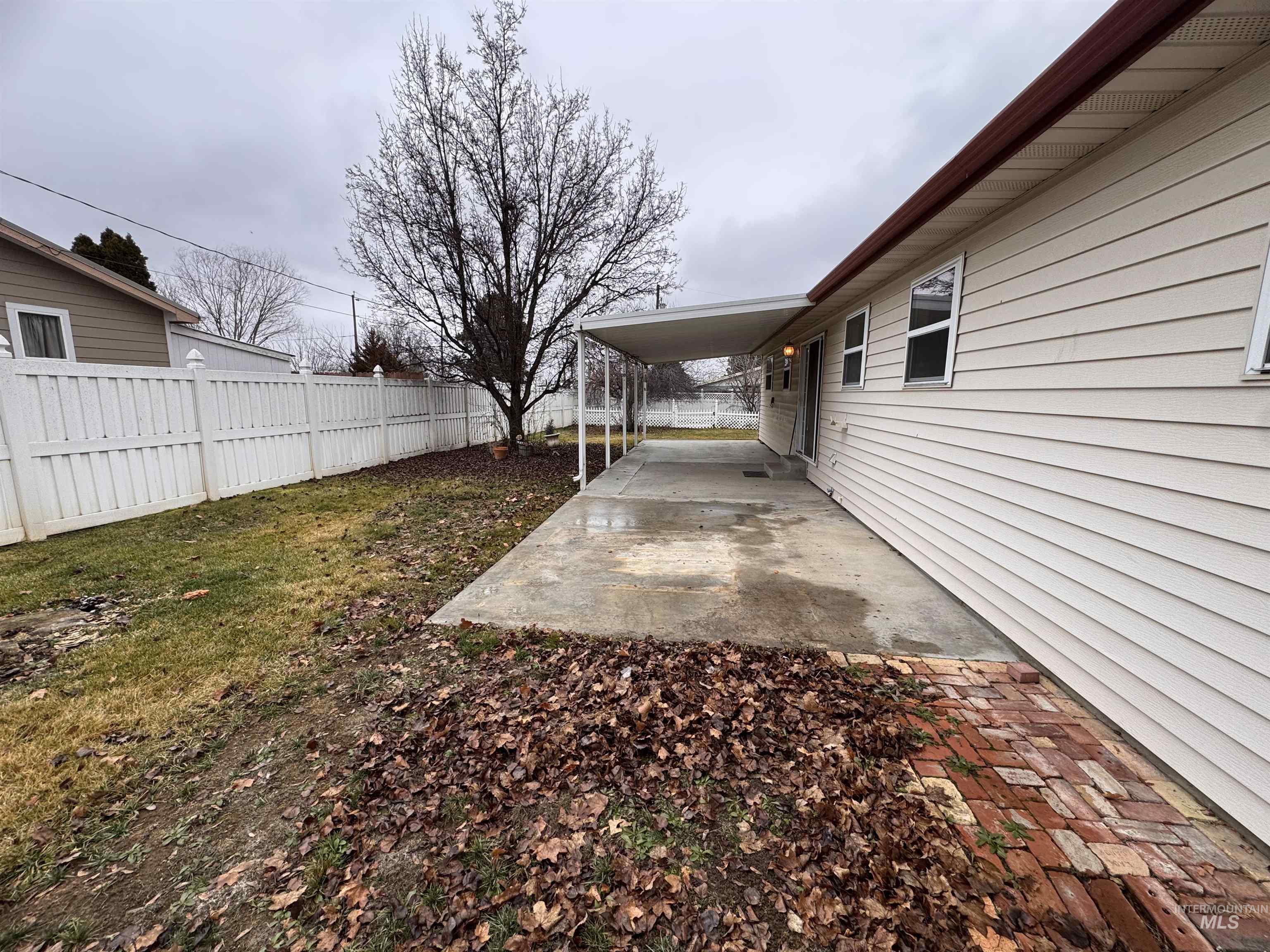View of yard with a patio area