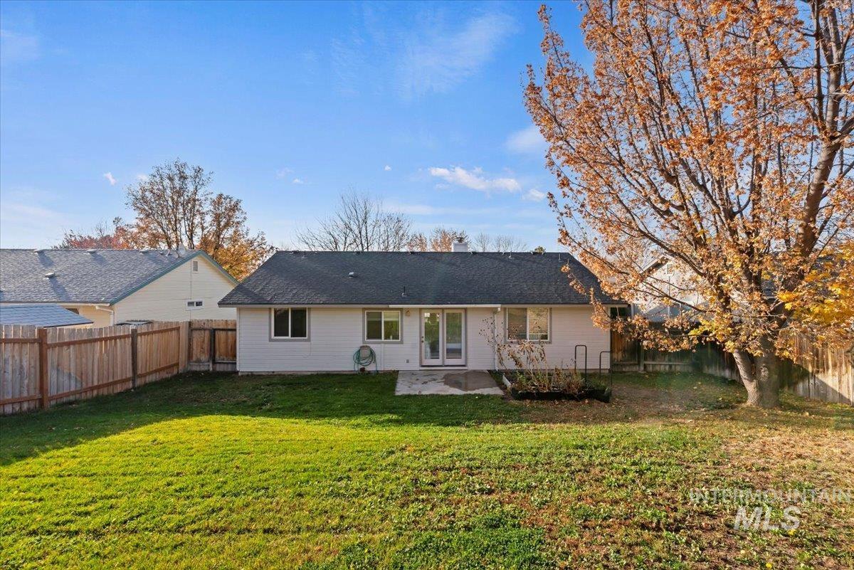 Back of house featuring a patio area and a fenced backyard
