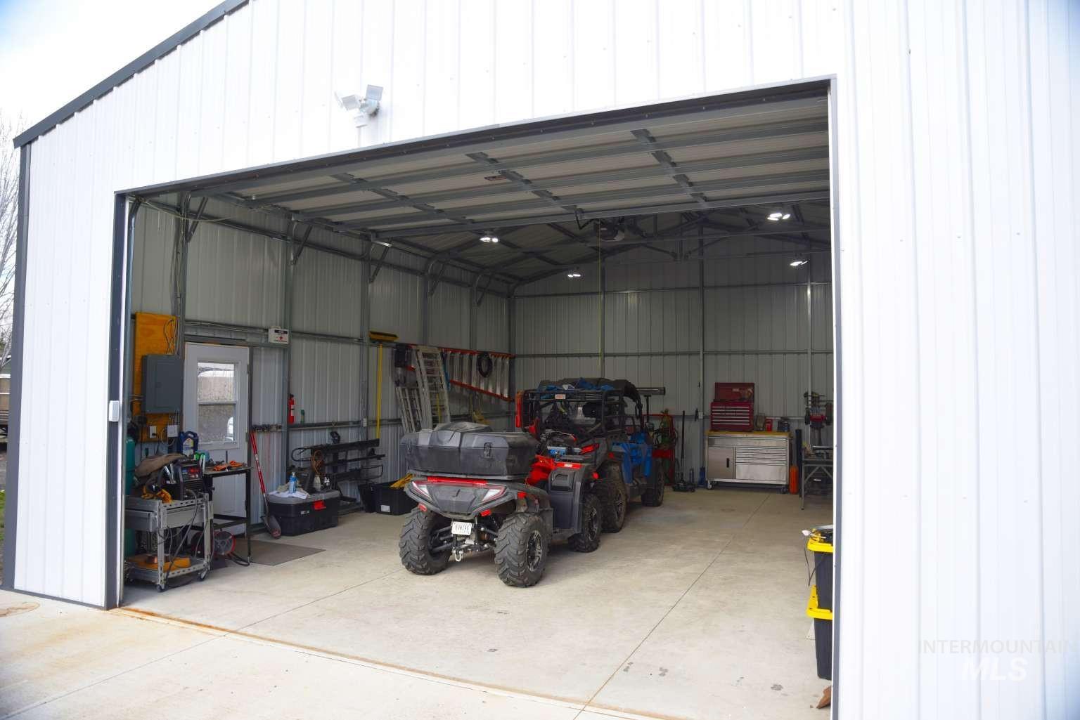 Garage featuring electric panel