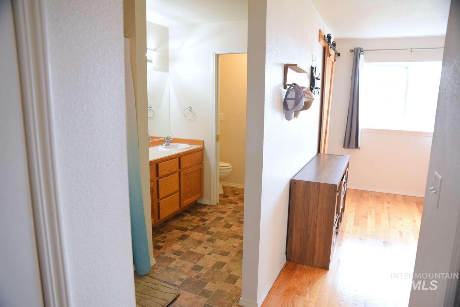 Bathroom featuring toilet and vanity