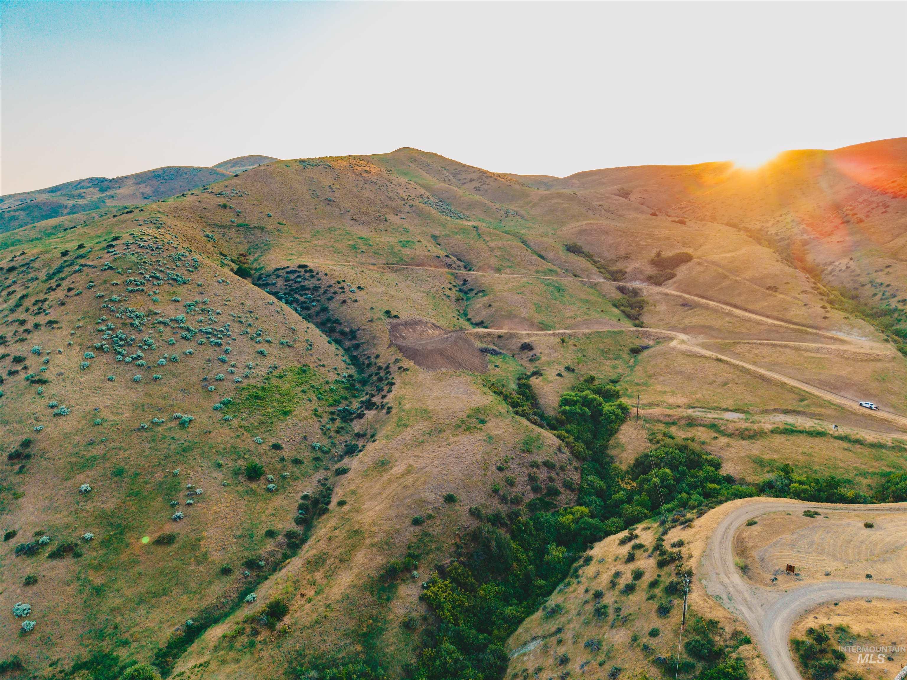 Drone / aerial view of a mountain backdrop