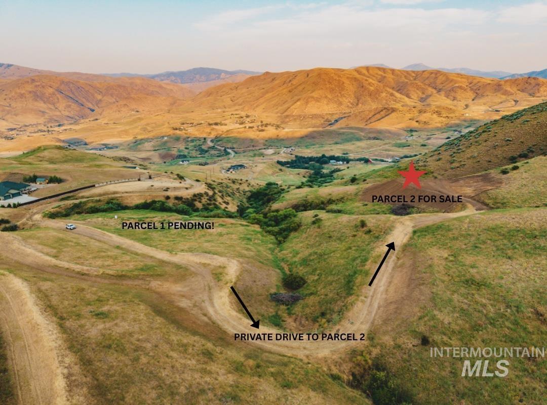 Aerial overview of property's location with mountains