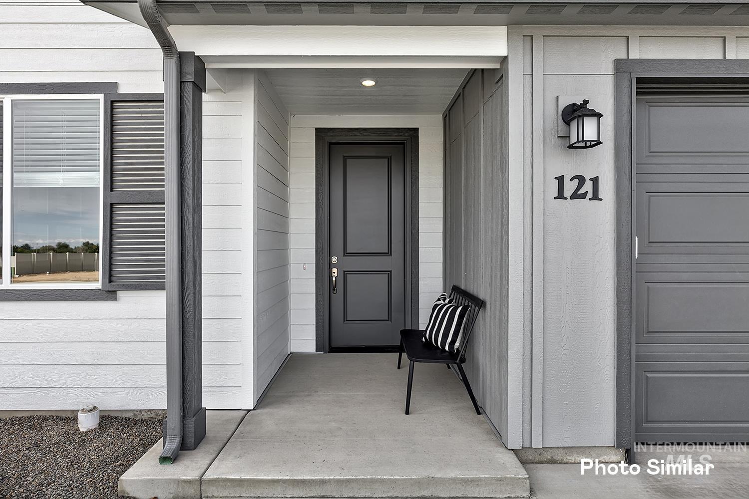Entrance to property with a porch