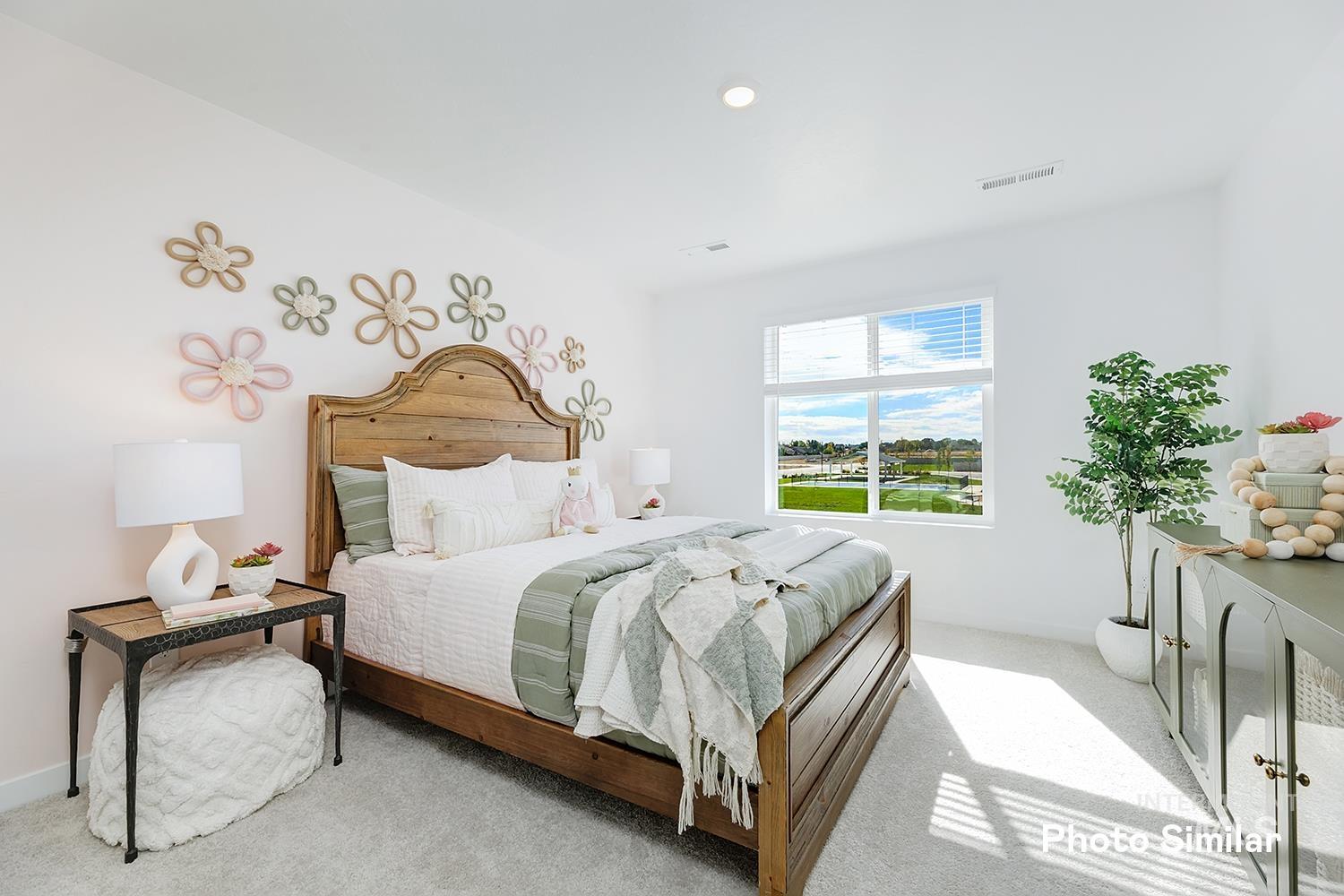 Carpeted bedroom featuring recessed lighting
