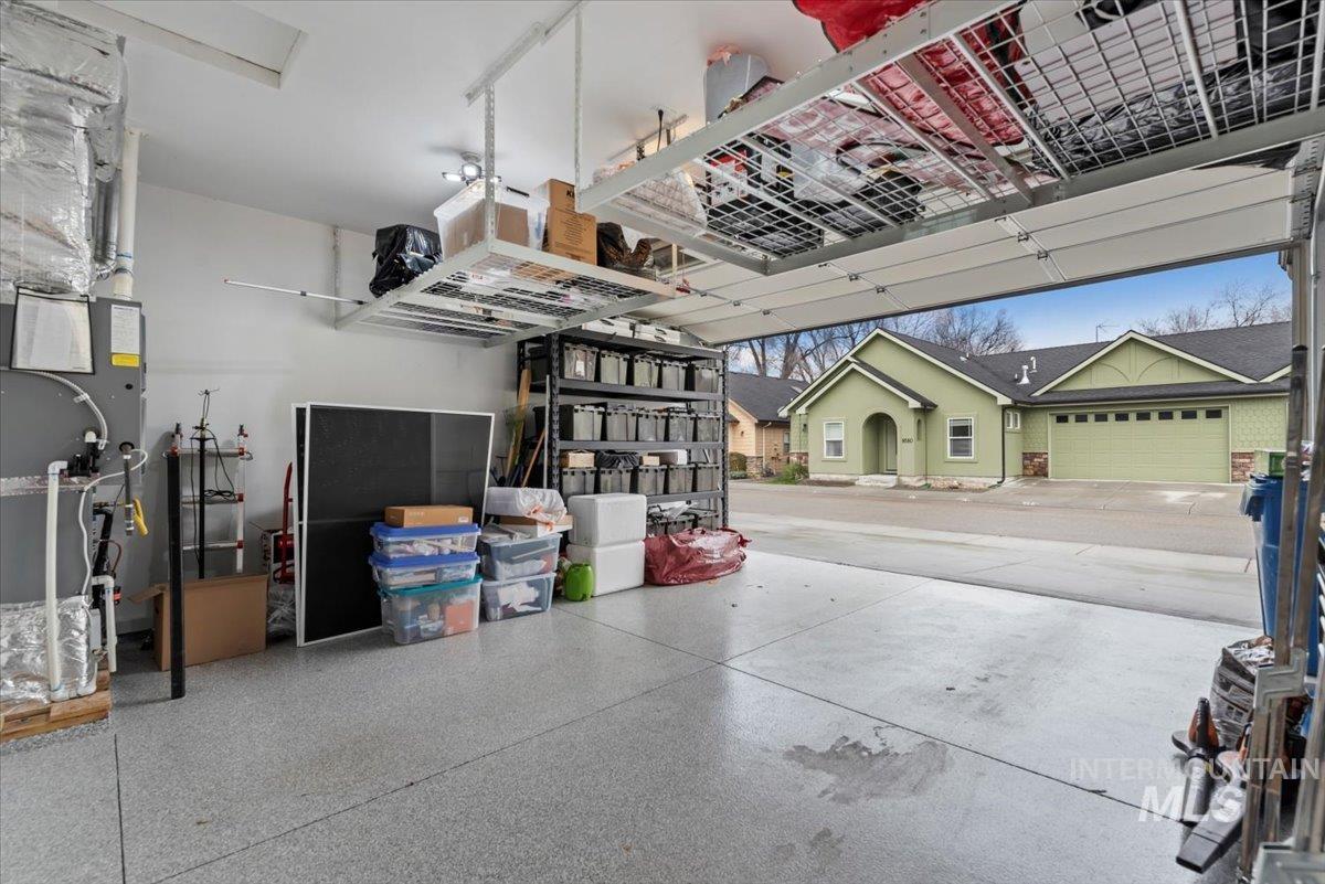Garage featuring heating unit