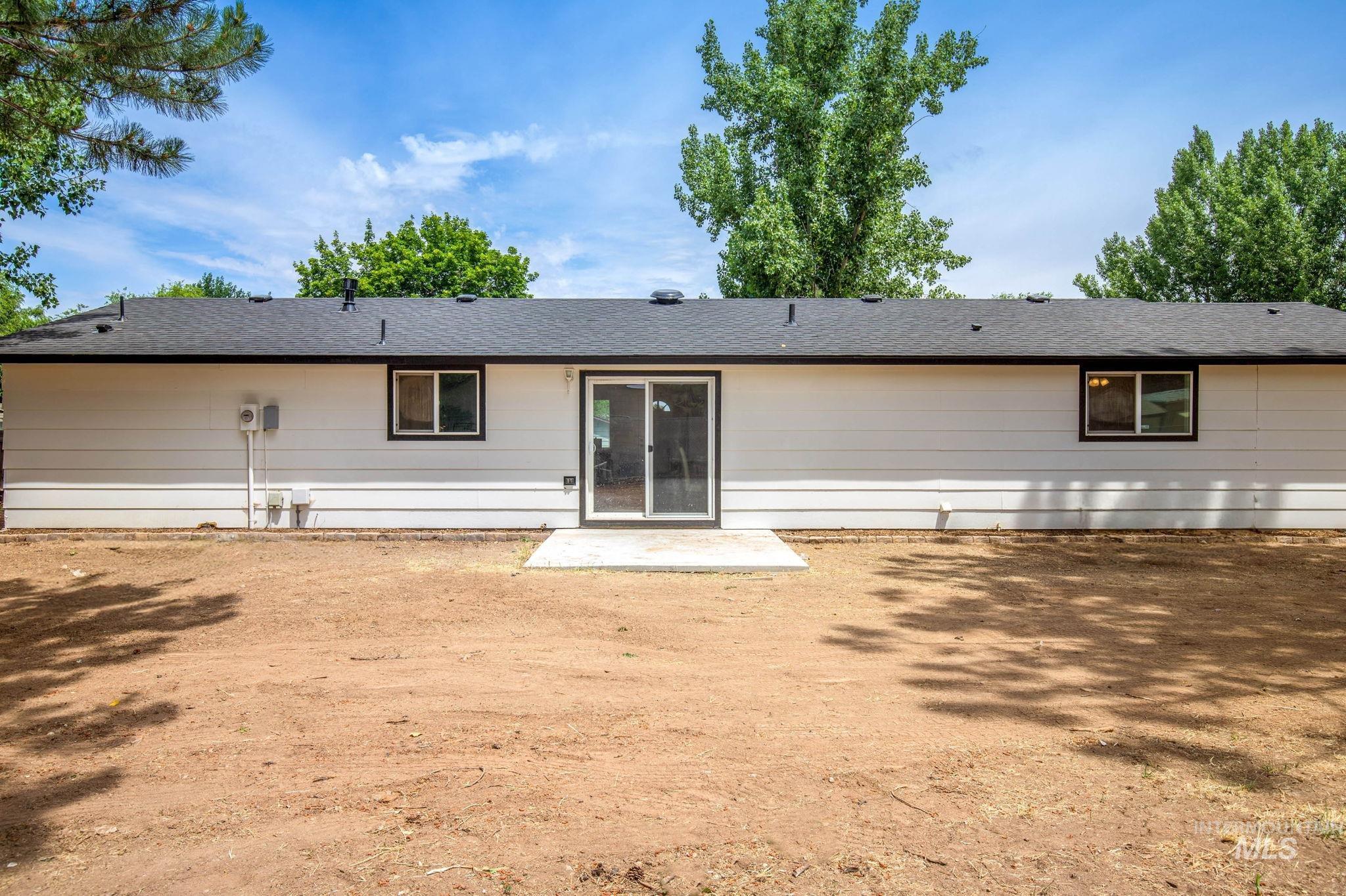 Back of property featuring a patio