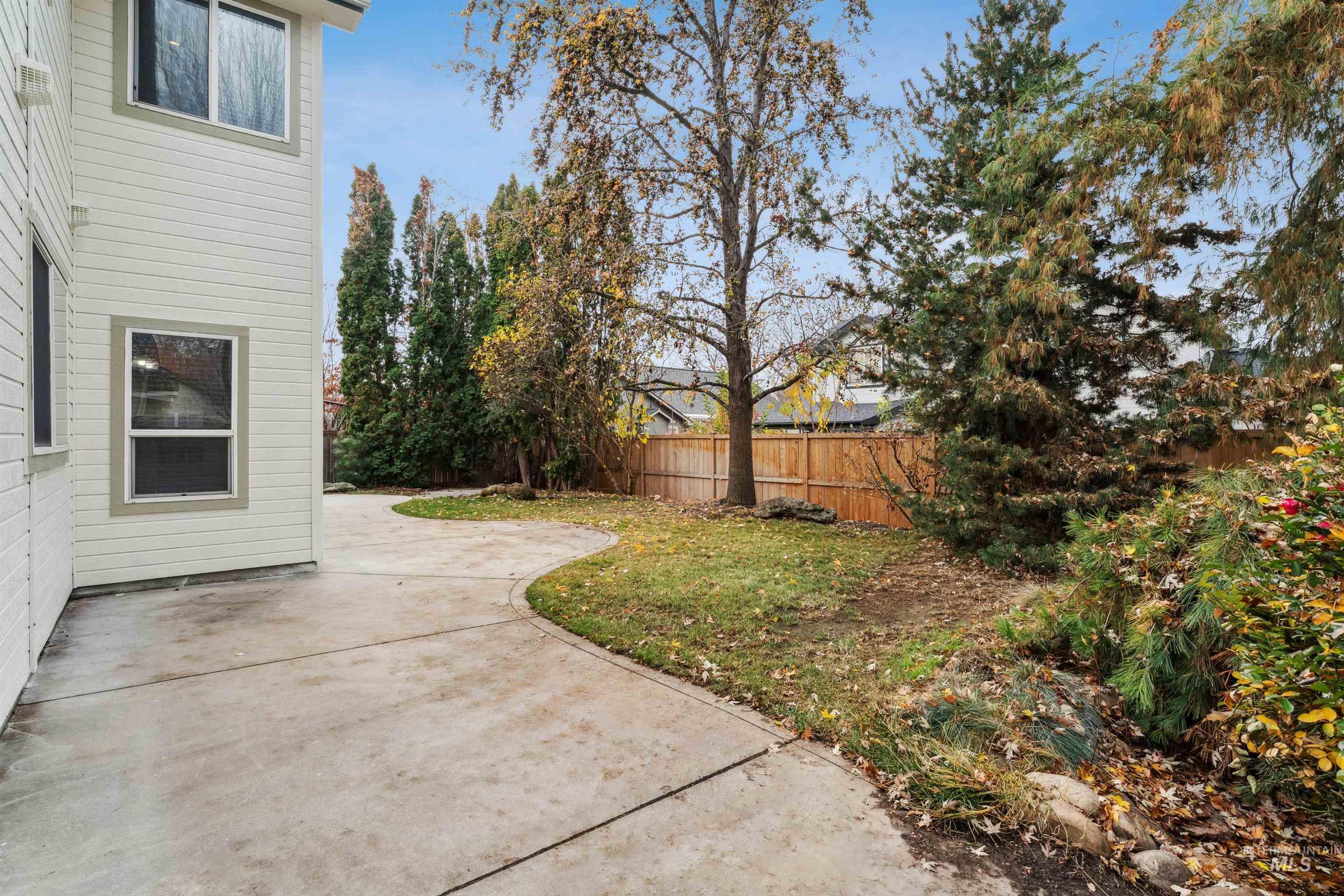 Fenced backyard featuring a patio area