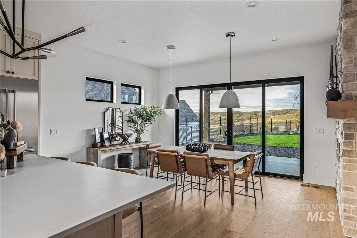 Dining room featuring light wood-style floors