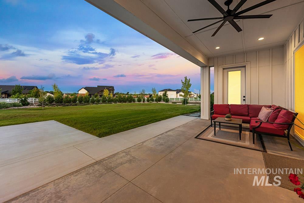 View of patio / terrace featuring ceiling fan and an outdoor hangout area