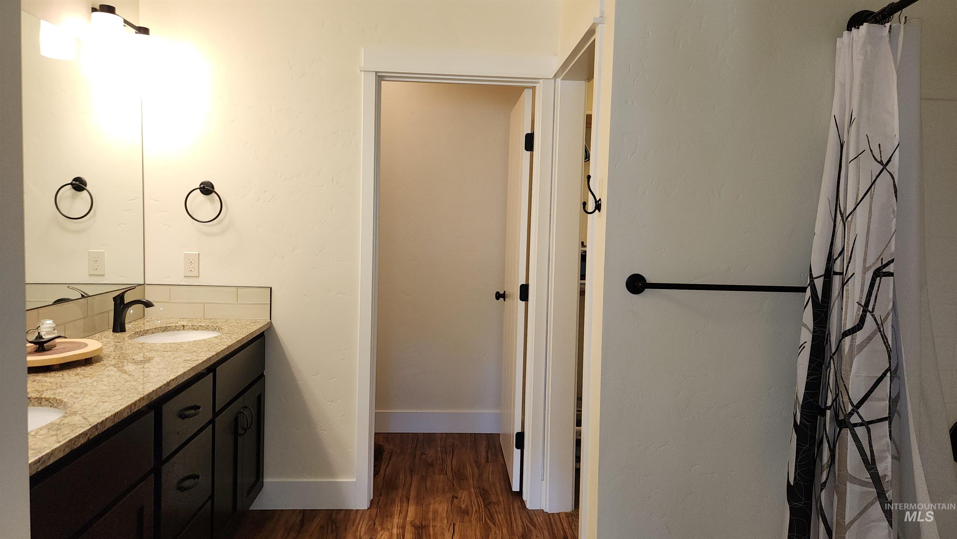 Toilet closet, walk-in closet, tub/shower combo, double sinks with grantie countertops, lockable linen closet.