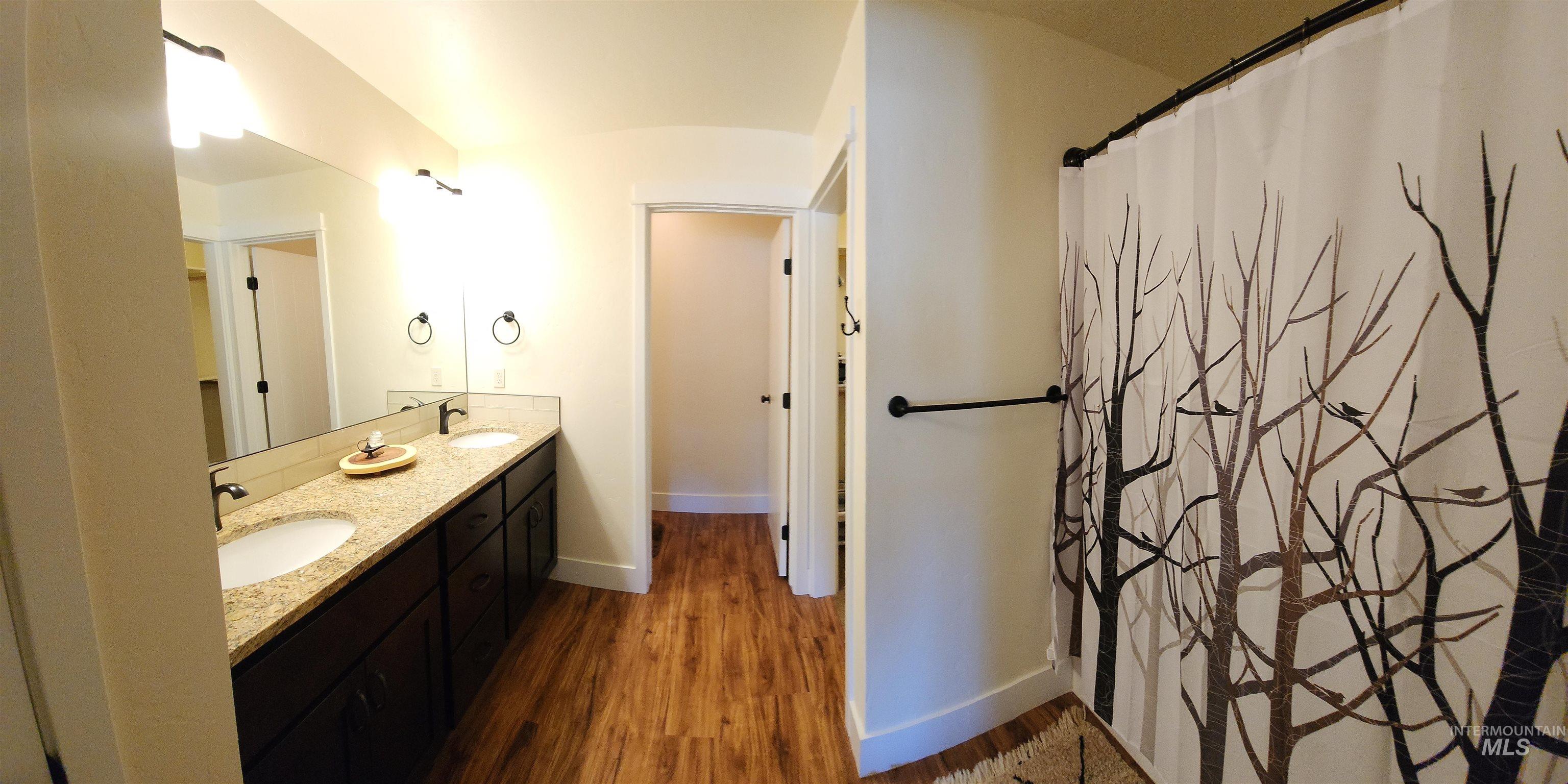 Toilet closet, walk-in closet, tub/shower combo, double sinks with grantie countertops, lockable linen closet.