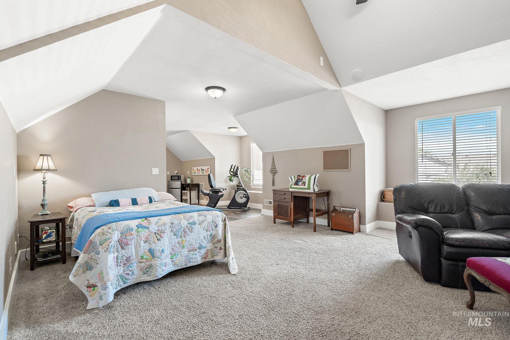 Loft area #2 with vaulted ceilings.