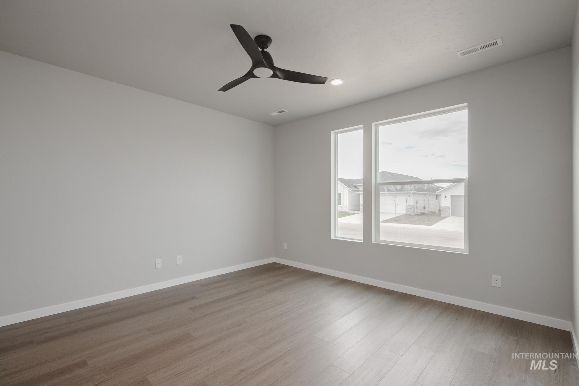 Unfurnished room featuring light wood-type flooring, recessed lighting, and ceiling fan