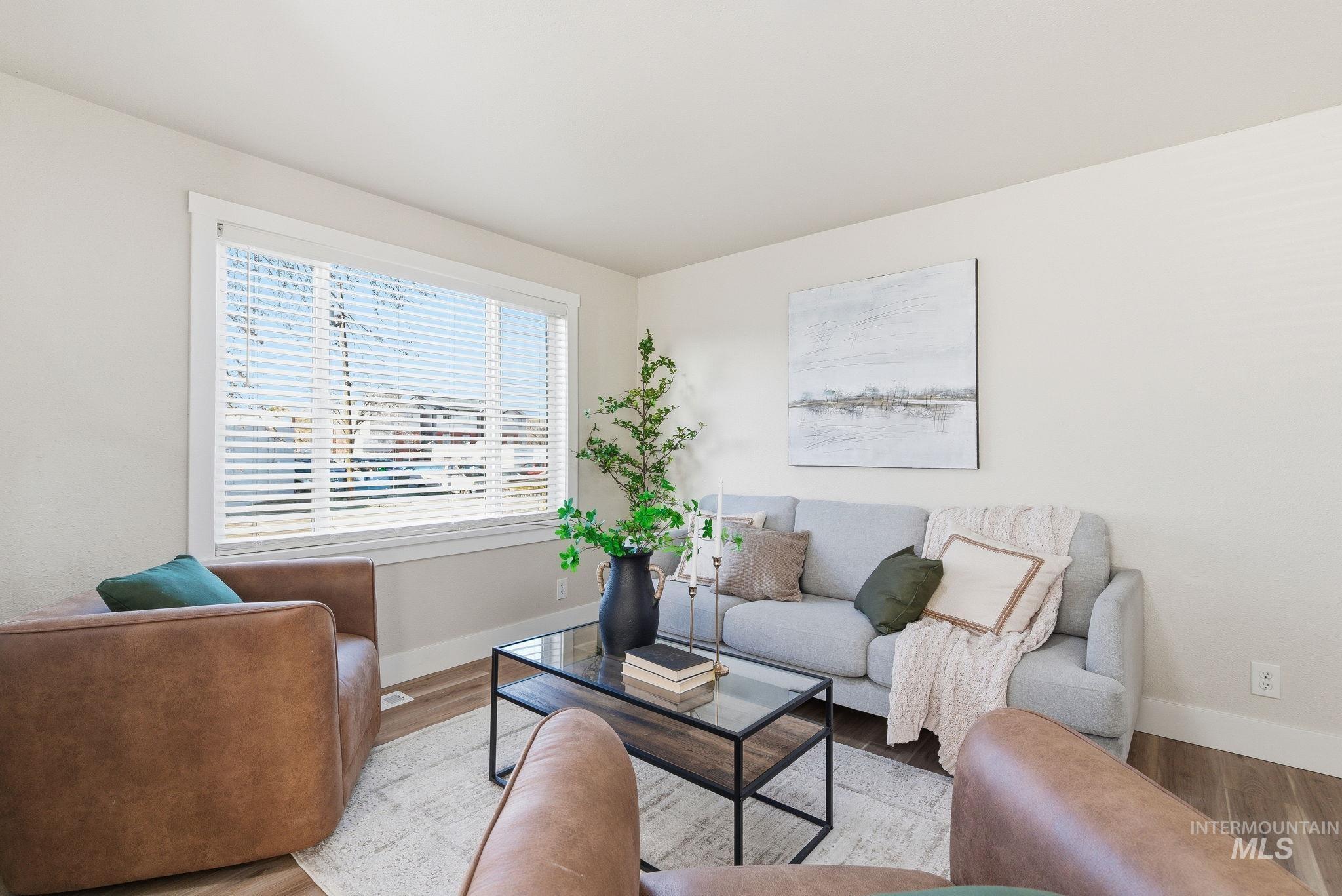 Living area featuring wood finished floors