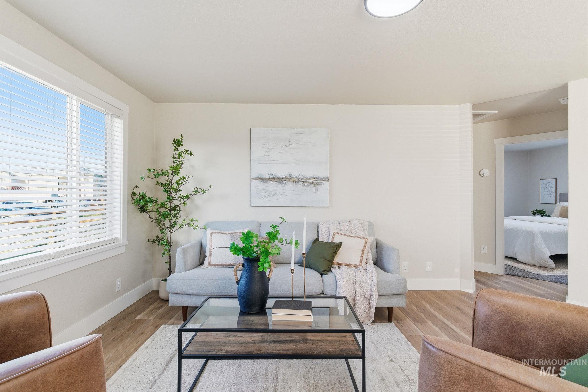 Living area featuring wood finished floors