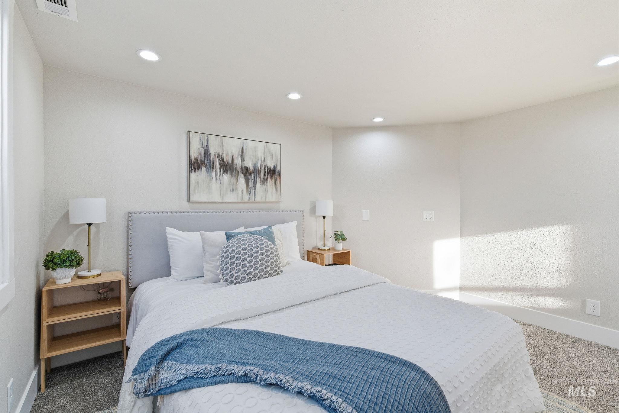 Bedroom with carpet flooring and recessed lighting