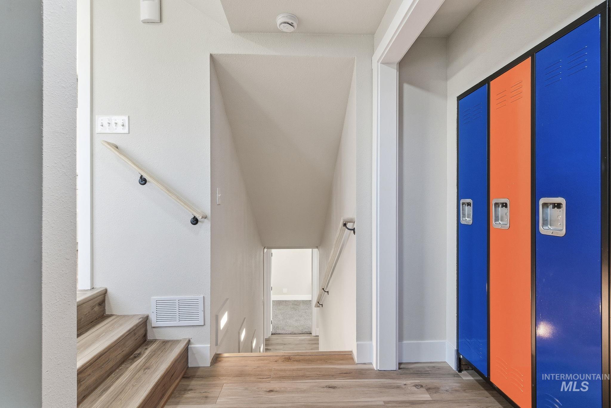 Stairway with wood finished floors