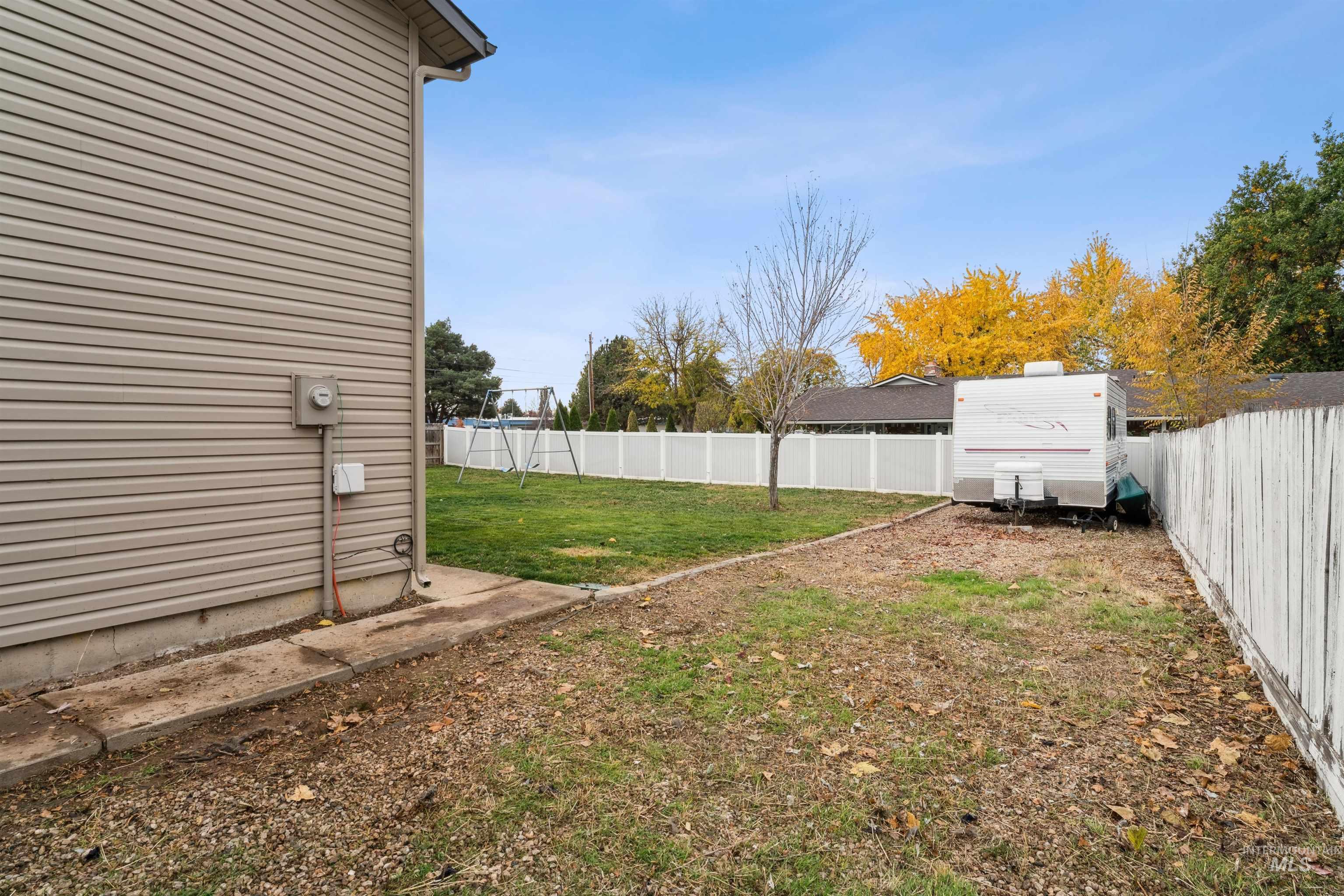 View of fenced backyard