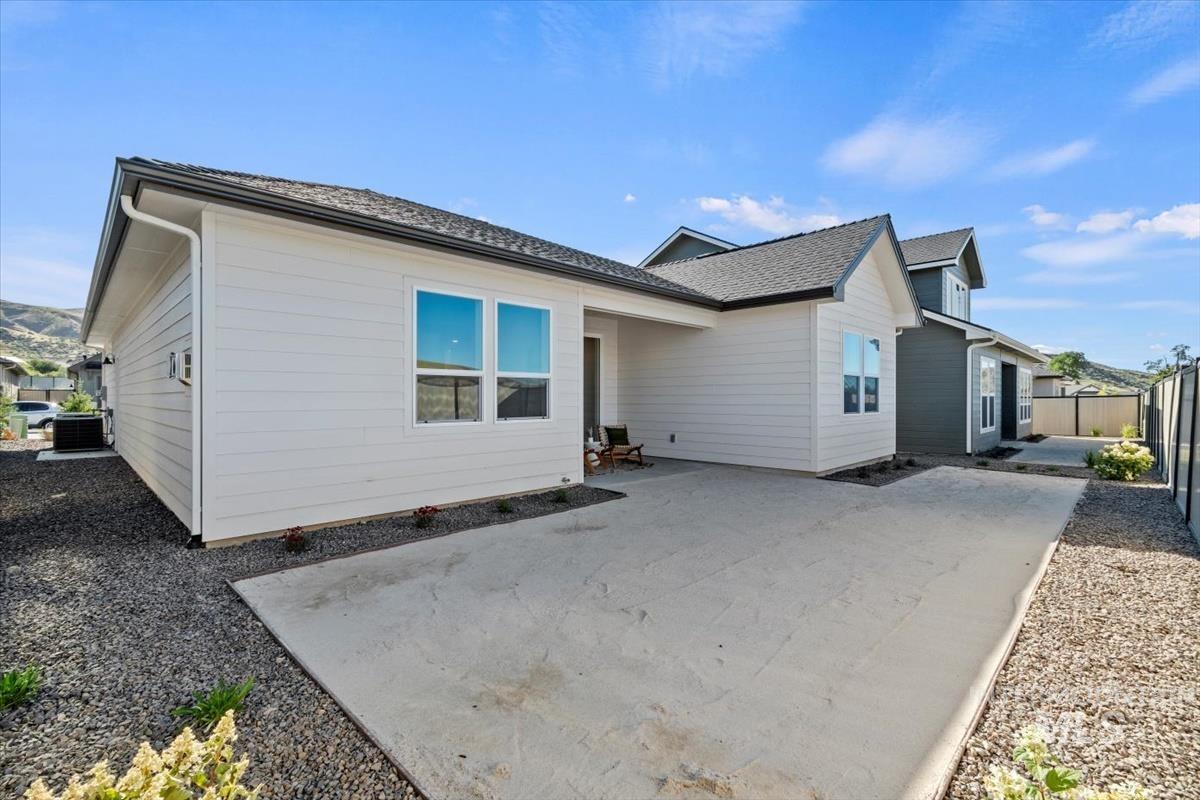 Rear view of house with a patio