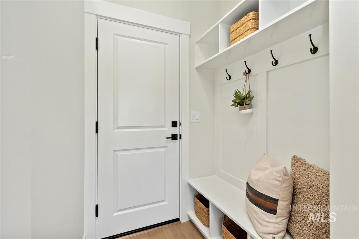 Mudroom with light wood-type flooring