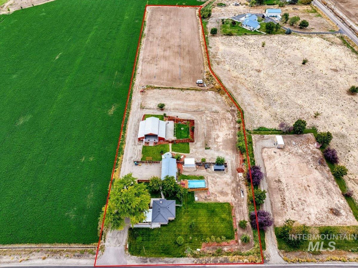 Overview of rural landscape featuring property boundaries highlighted